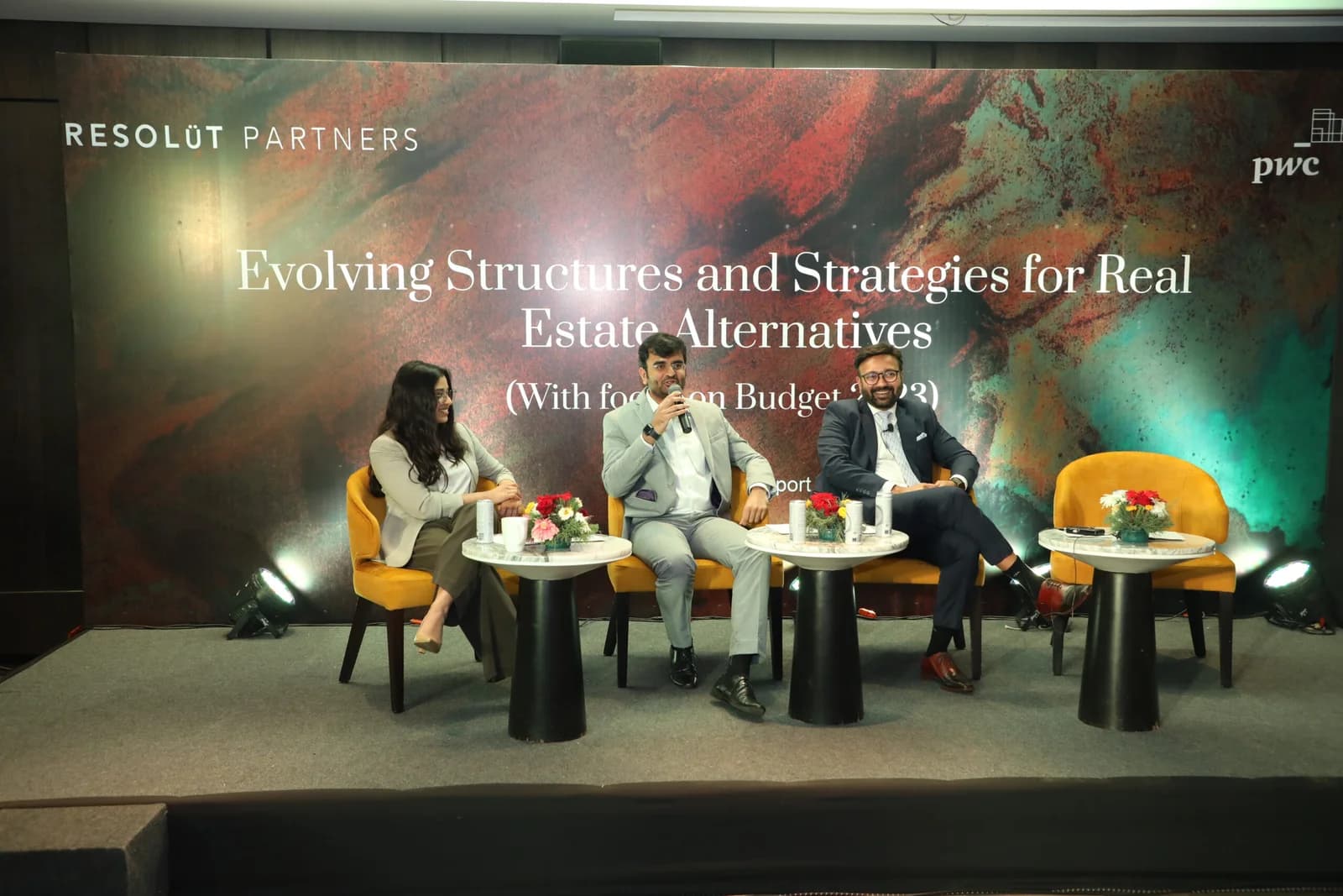 Conference speaker at podium 2