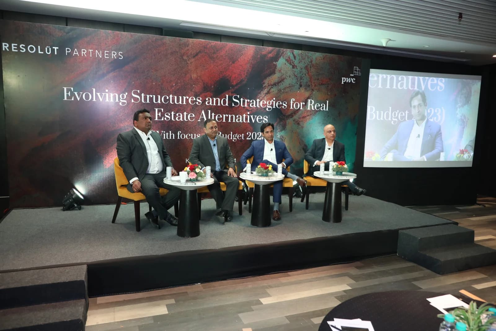 Conference speaker at podium 5