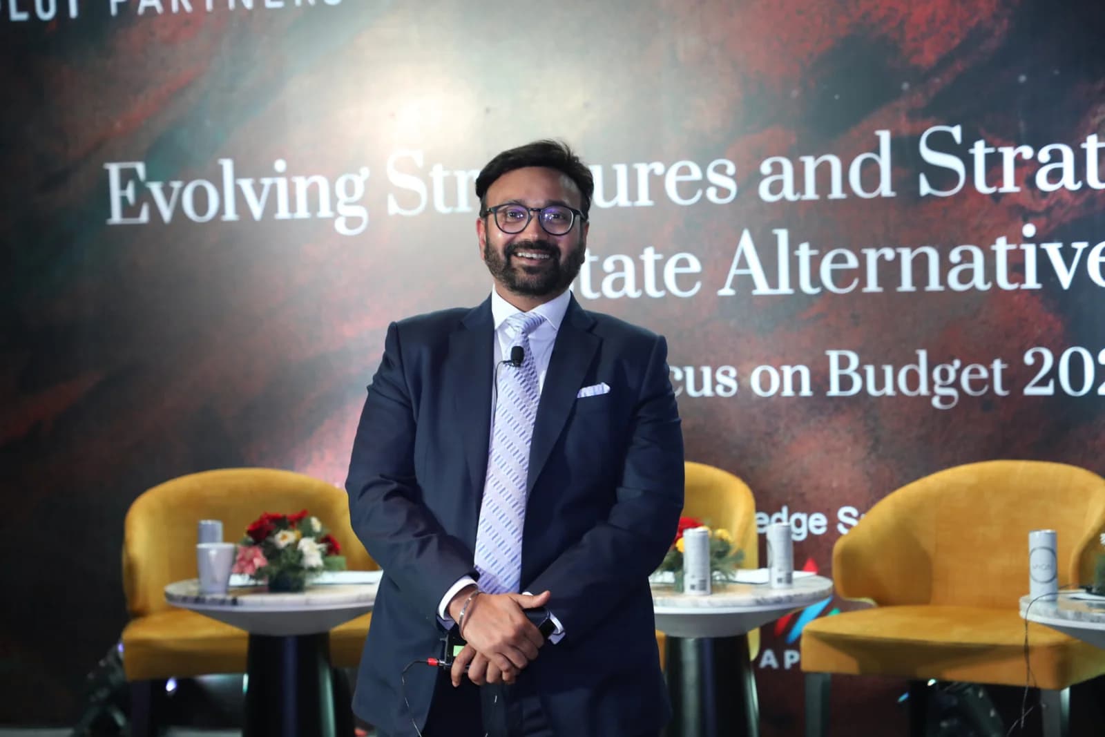 Conference speaker at podium 9