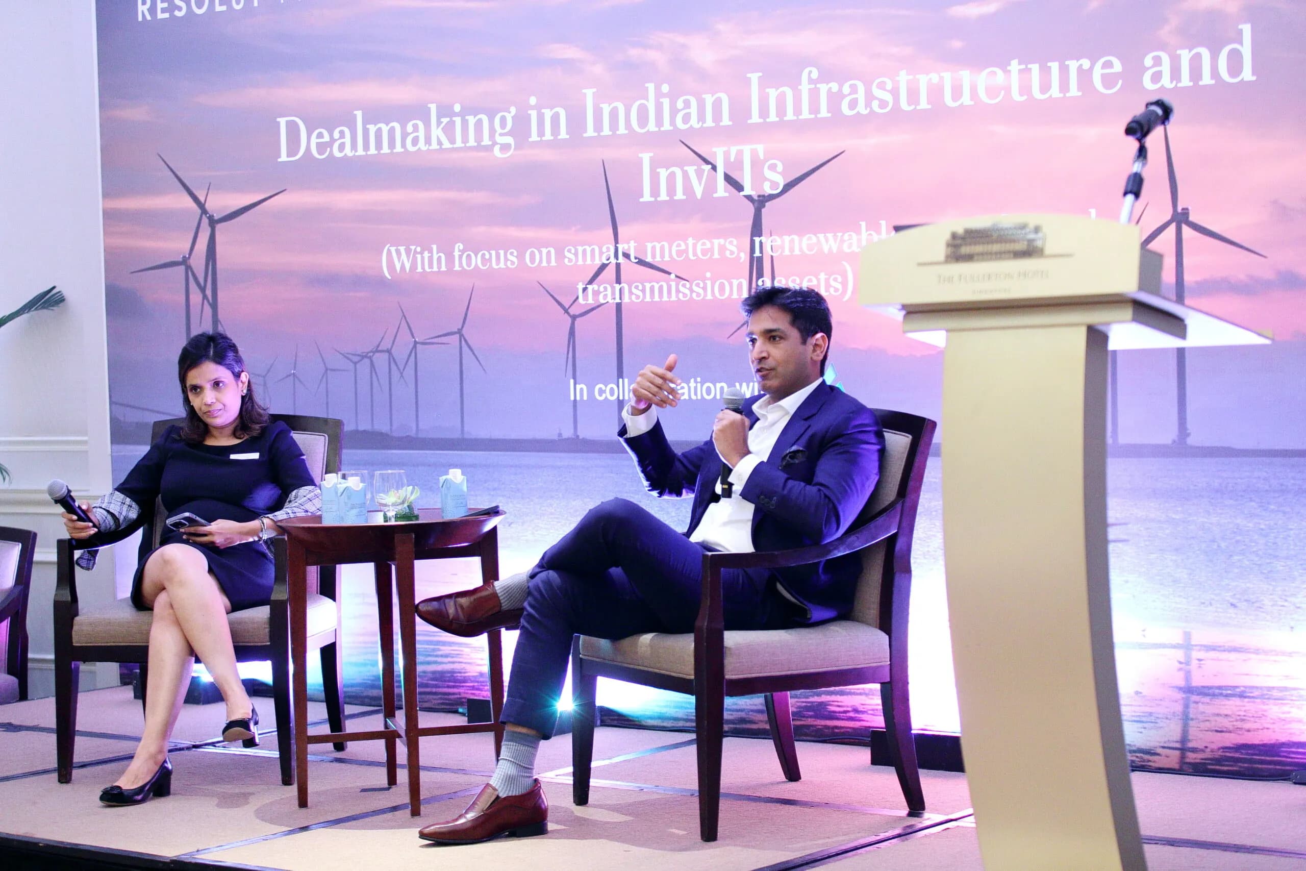 Conference speaker at podium 23