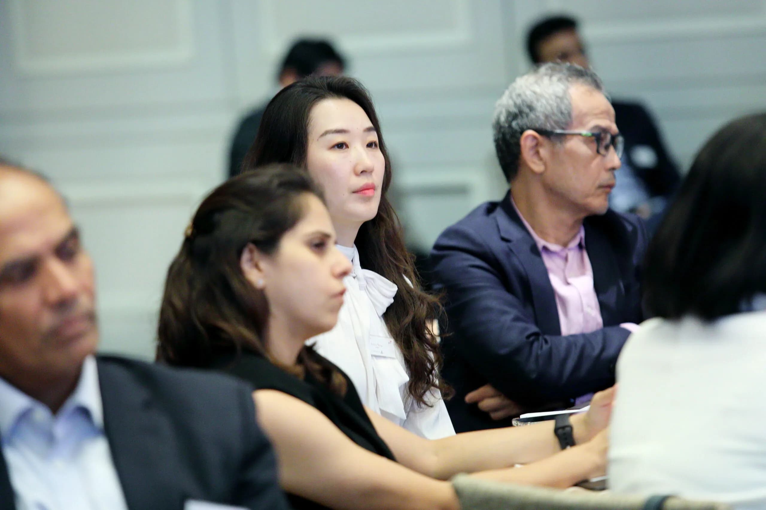 Conference speaker at podium 24