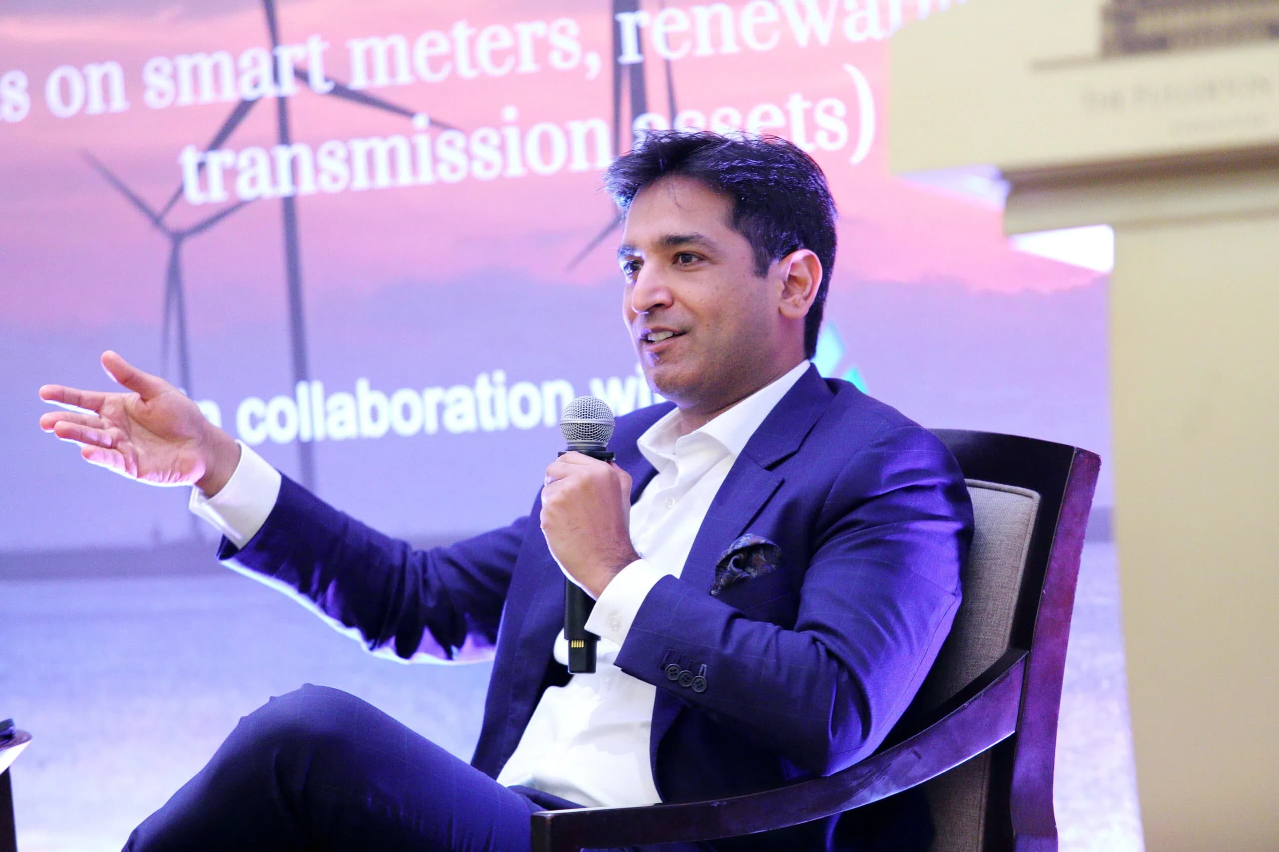 Conference speaker at podium 25