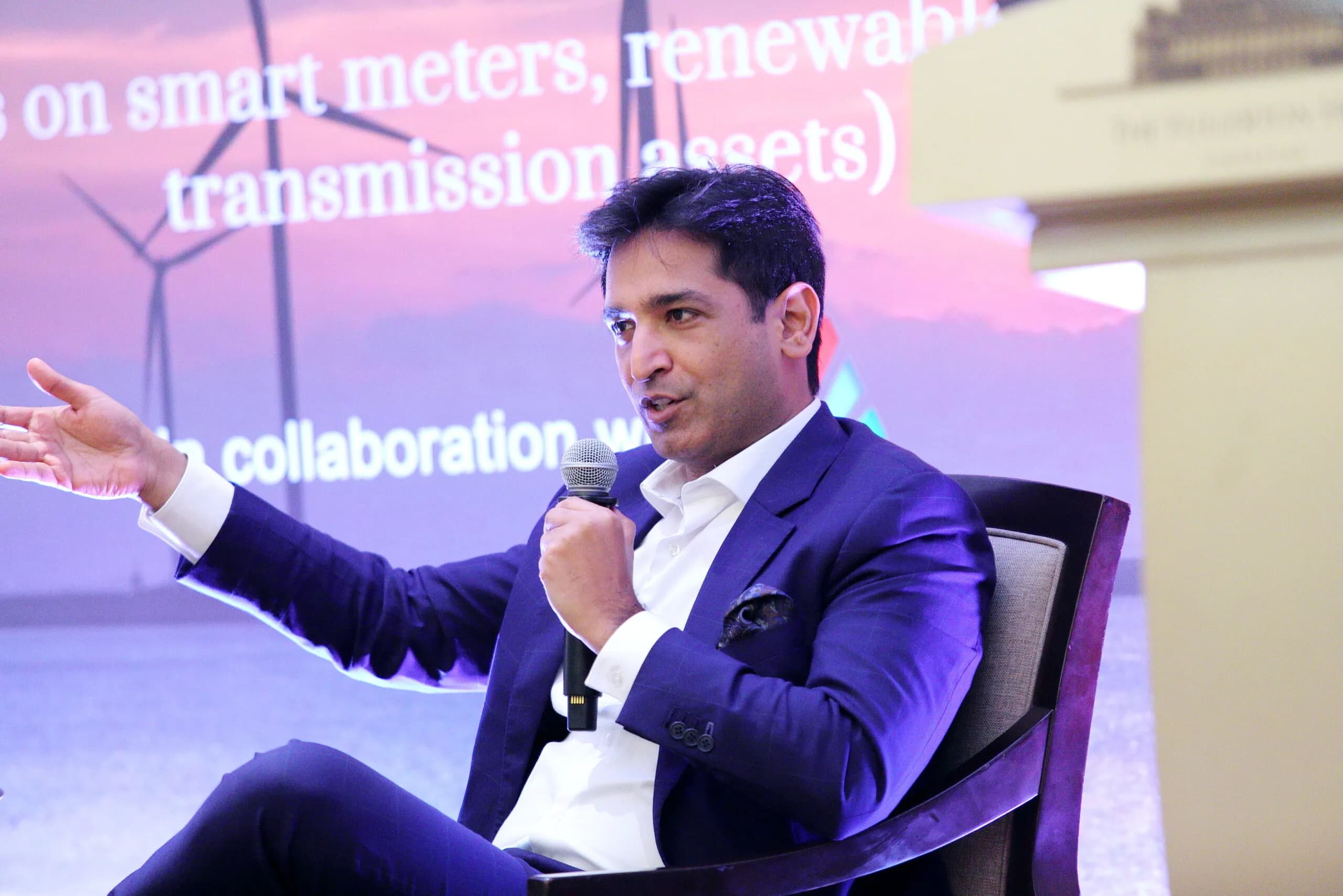 Conference speaker at podium 26