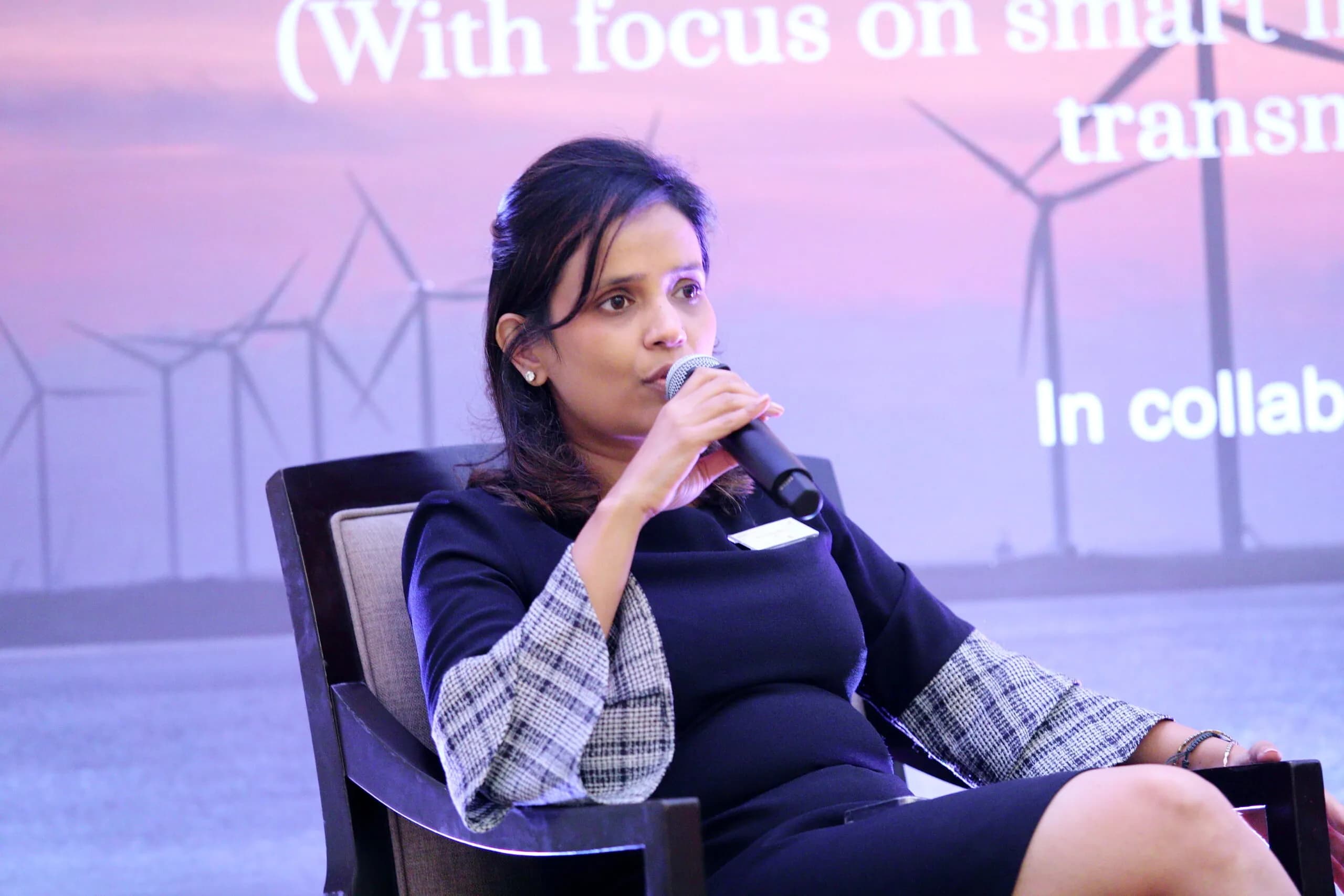 Conference speaker at podium 28