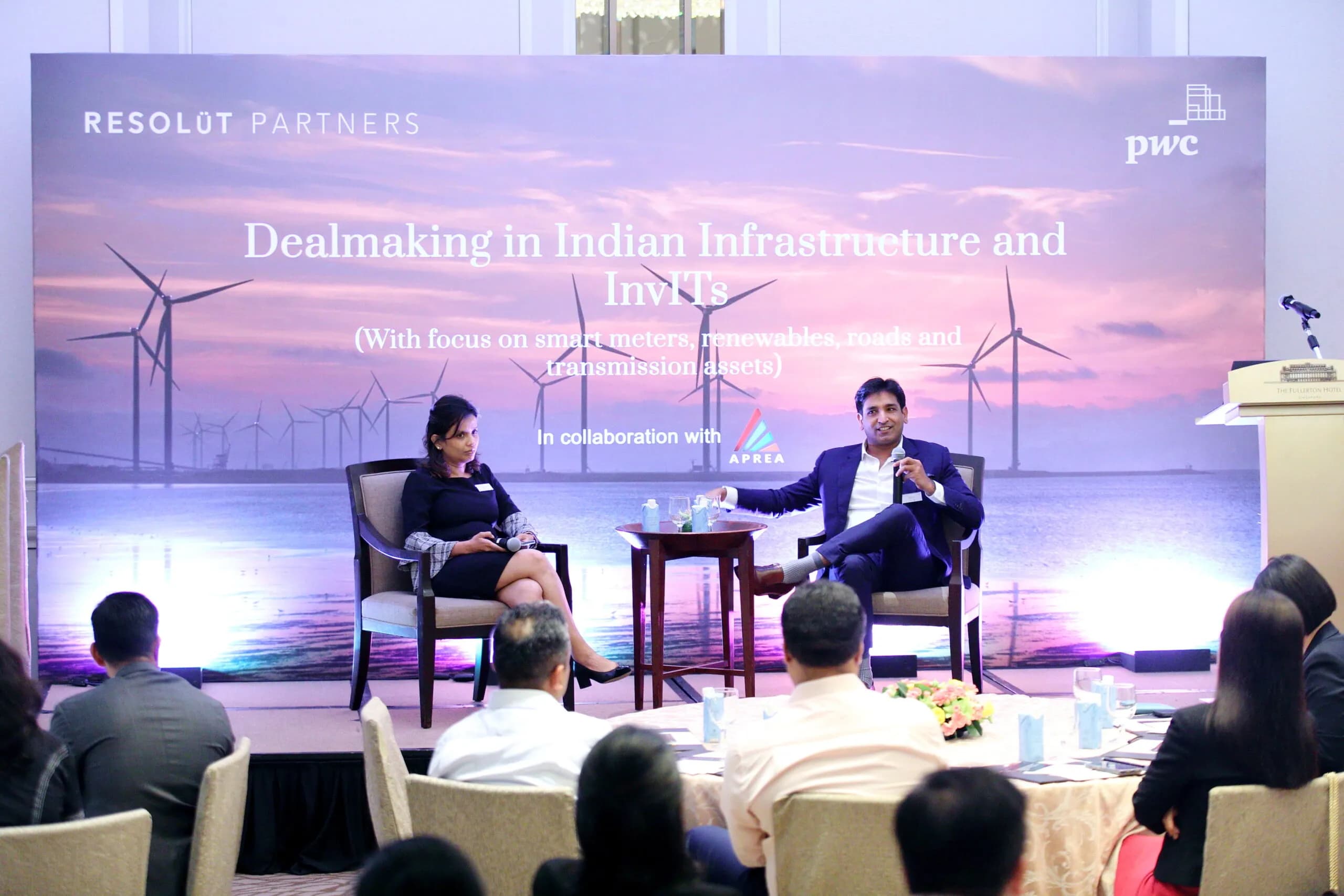 Conference speaker at podium 30