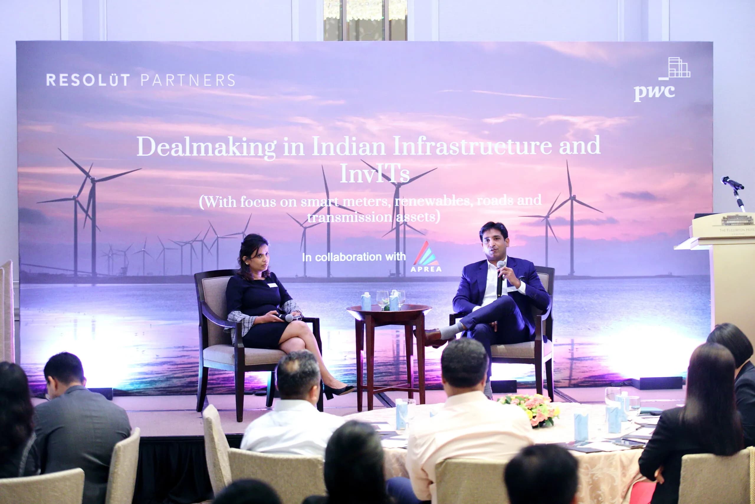 Conference speaker at podium 31