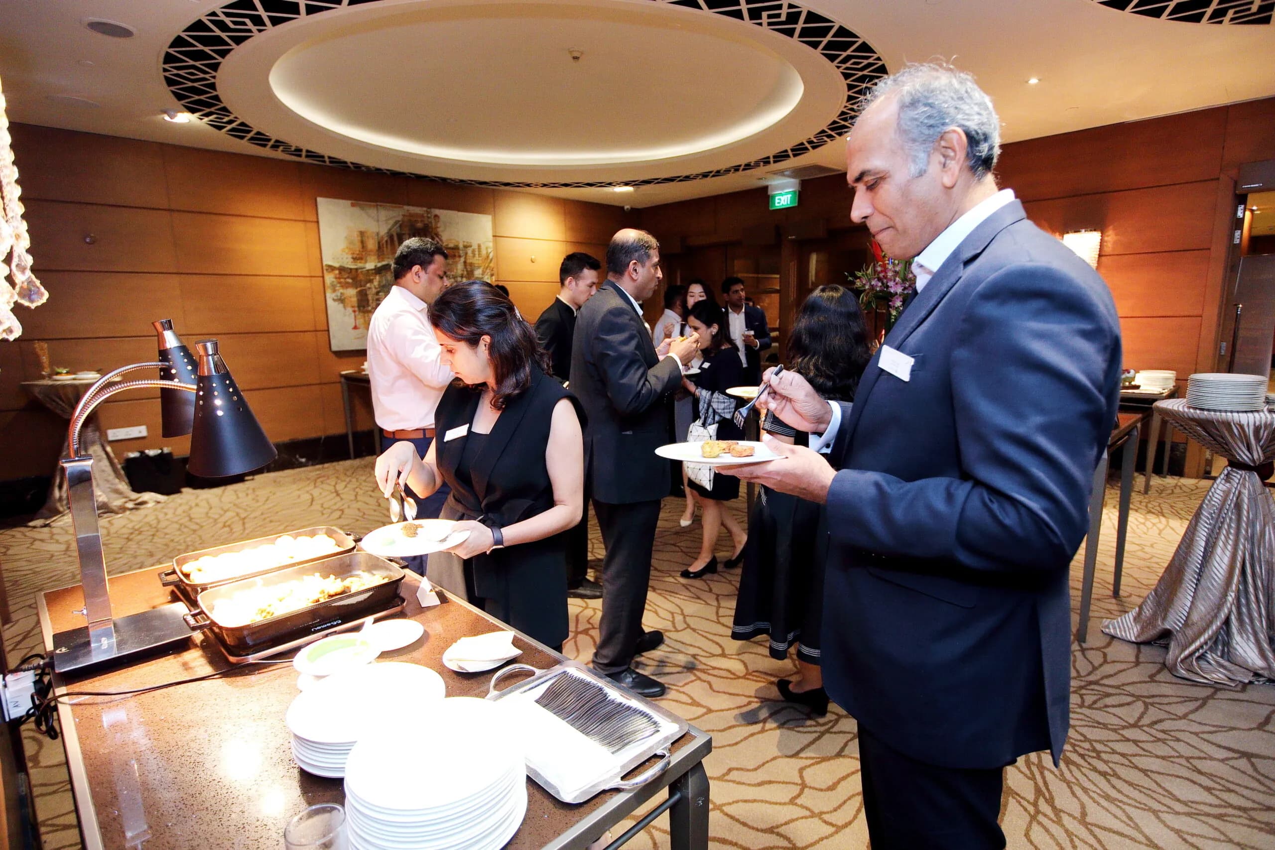 Conference speaker at podium 6