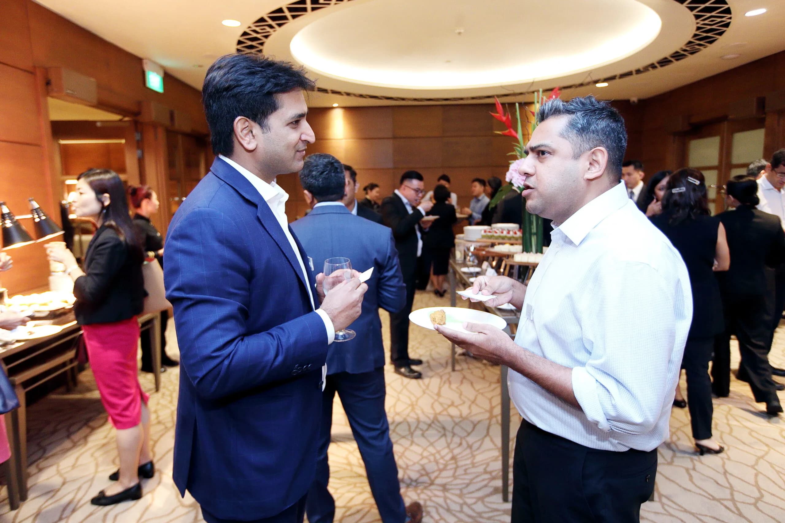 Conference speaker at podium 8