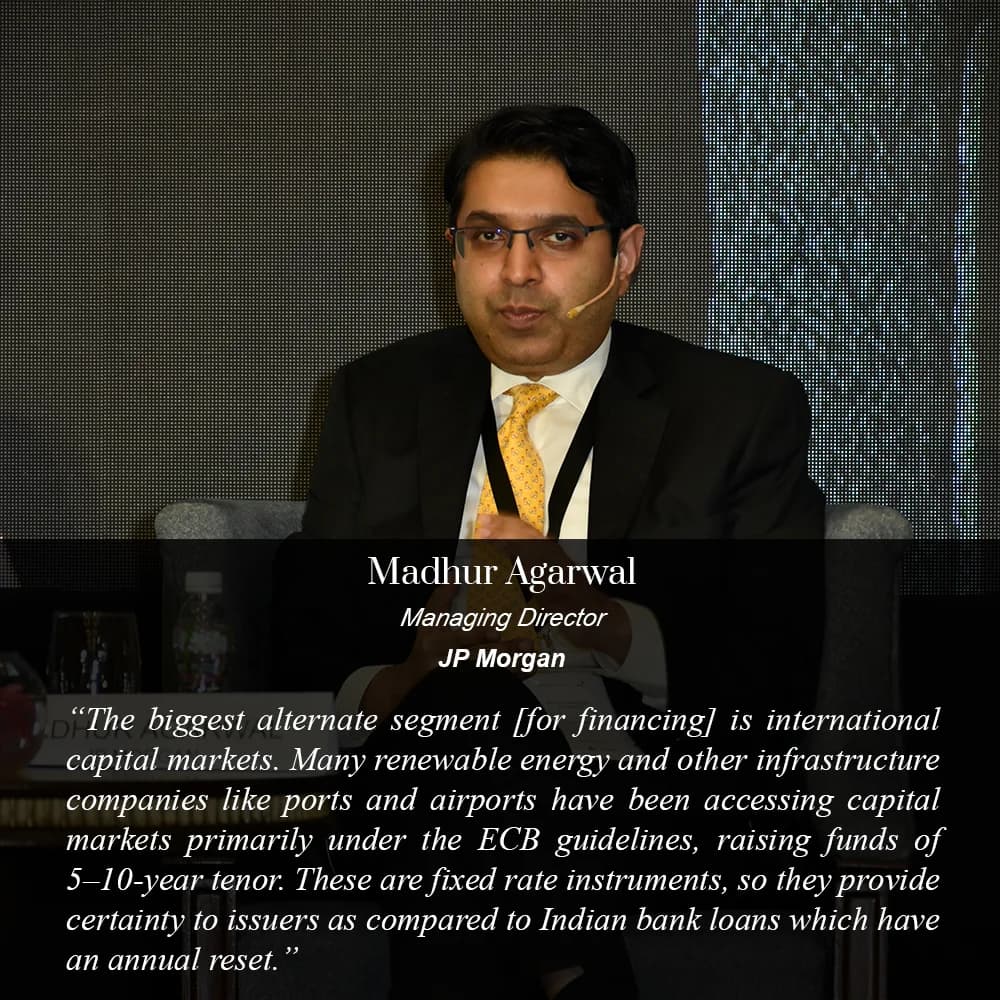 Conference speaker at podium 14