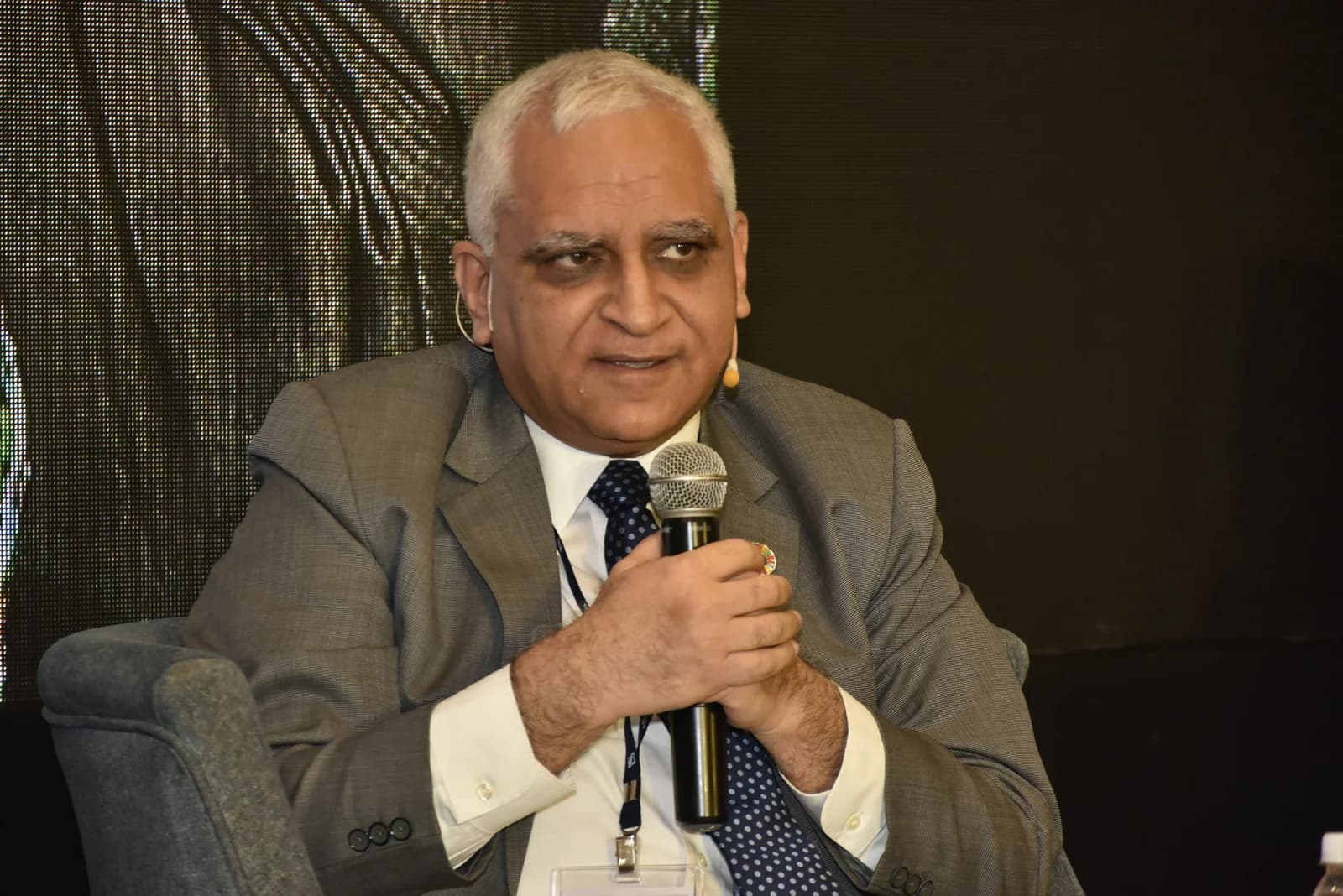 Conference speaker at podium 22