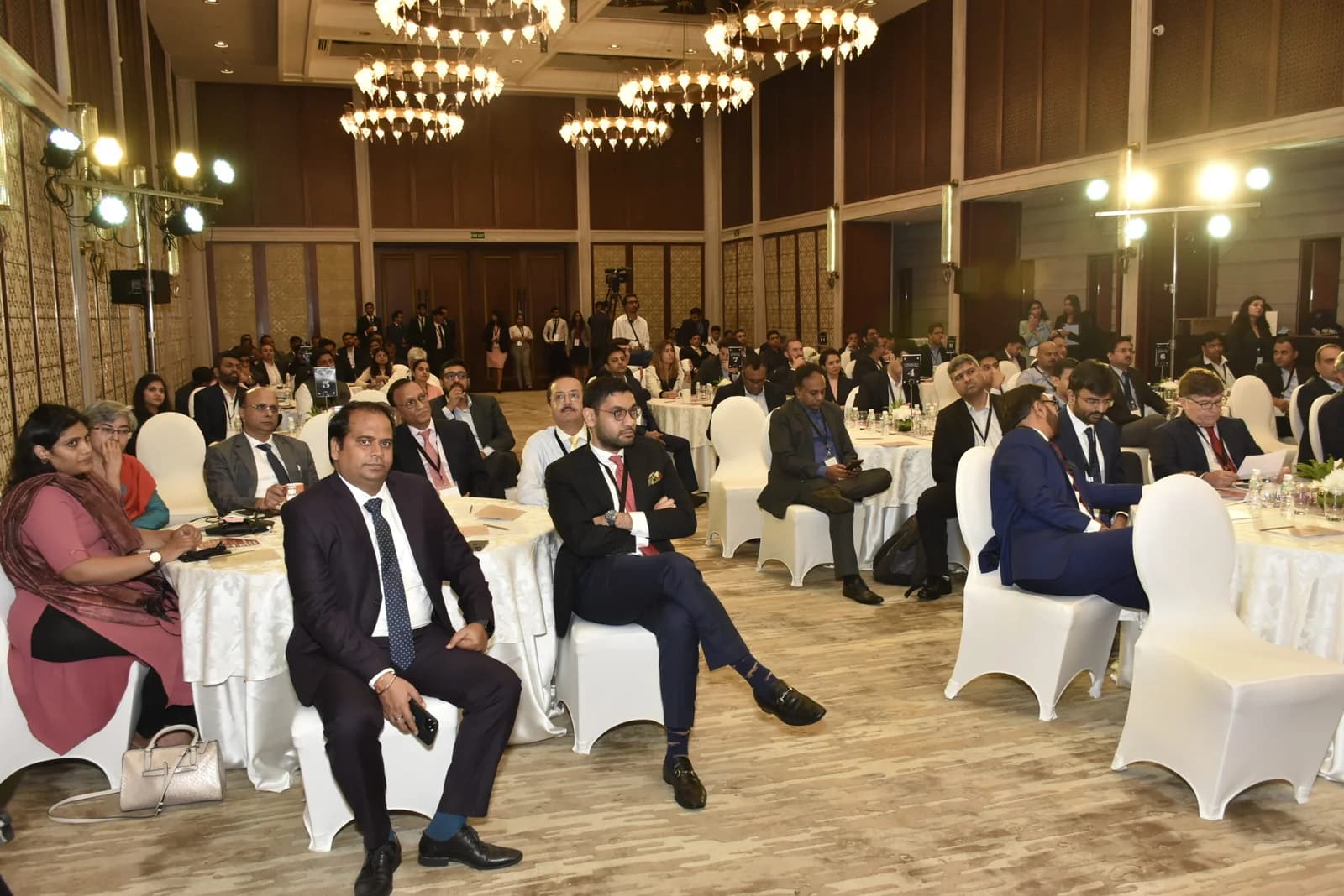 Conference speaker at podium 27