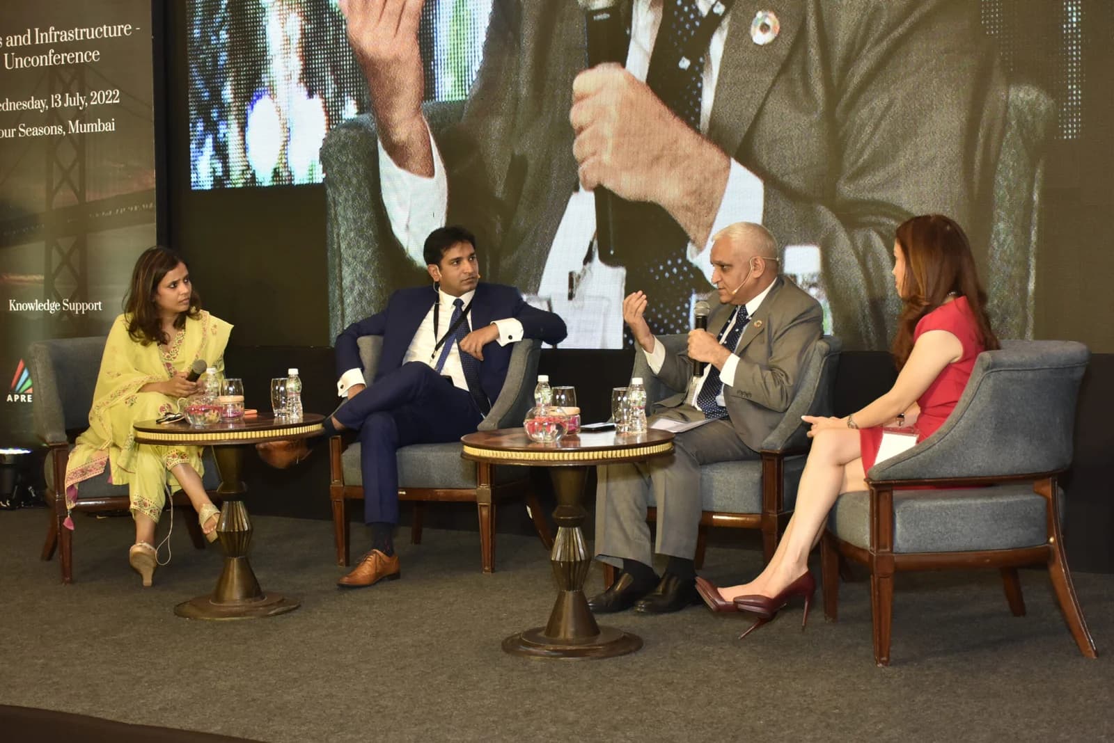 Conference speaker at podium 30