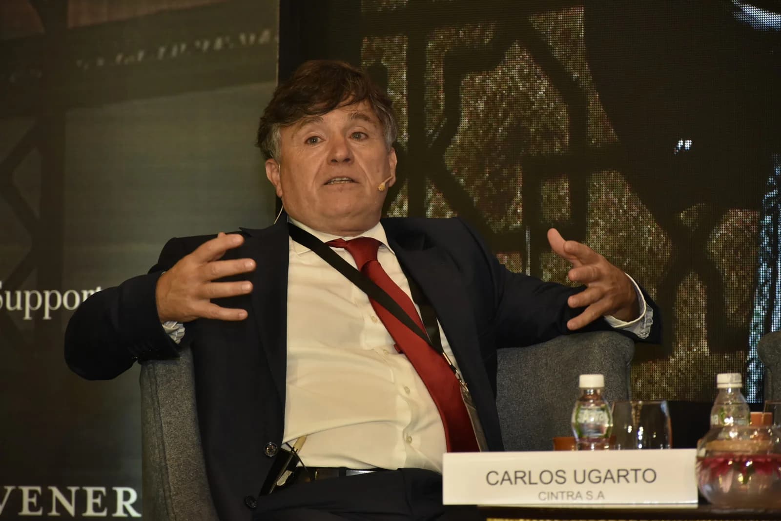 Conference speaker at podium 37