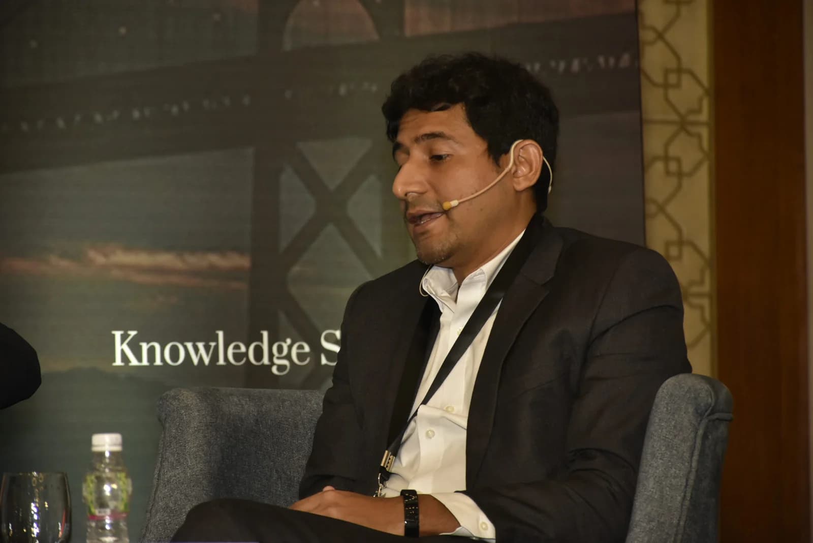 Conference speaker at podium 39