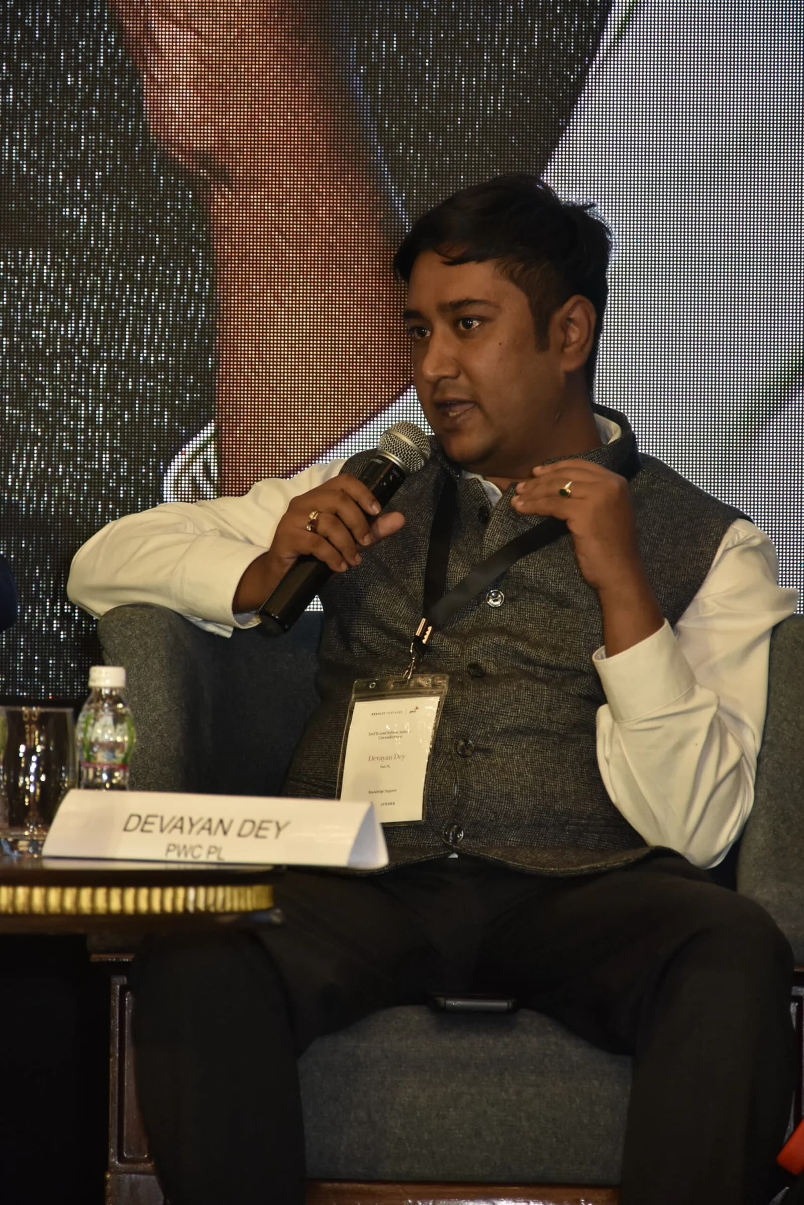 Conference speaker at podium 40