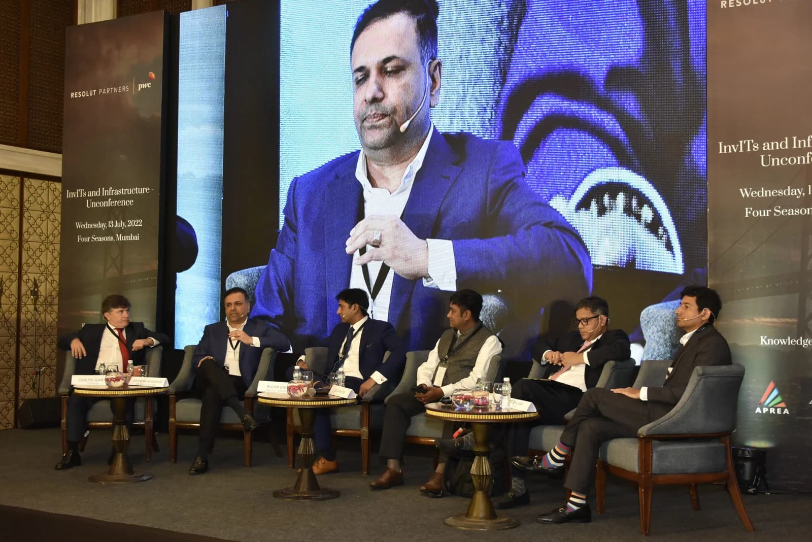 Conference speaker at podium 45