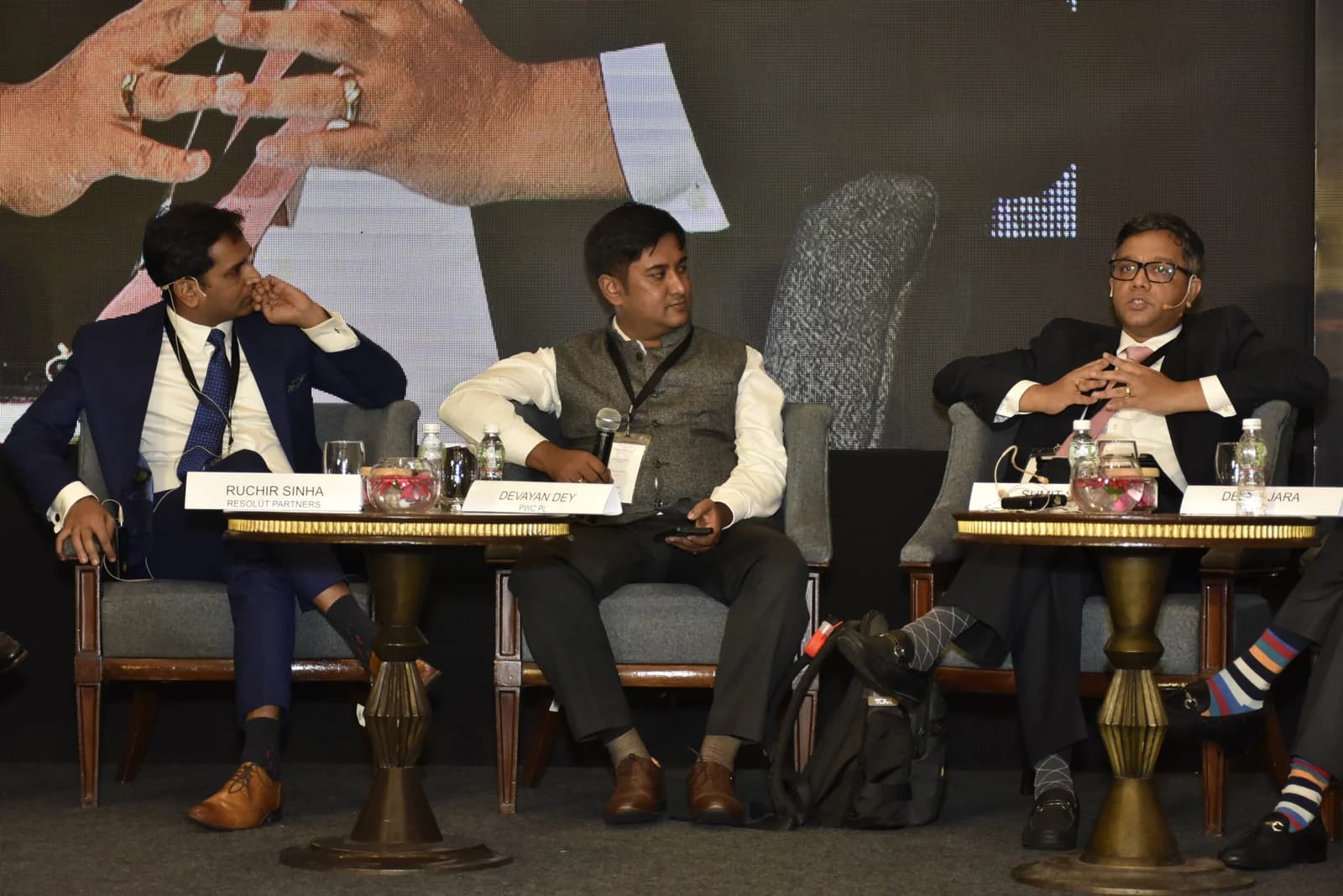 Conference speaker at podium 47