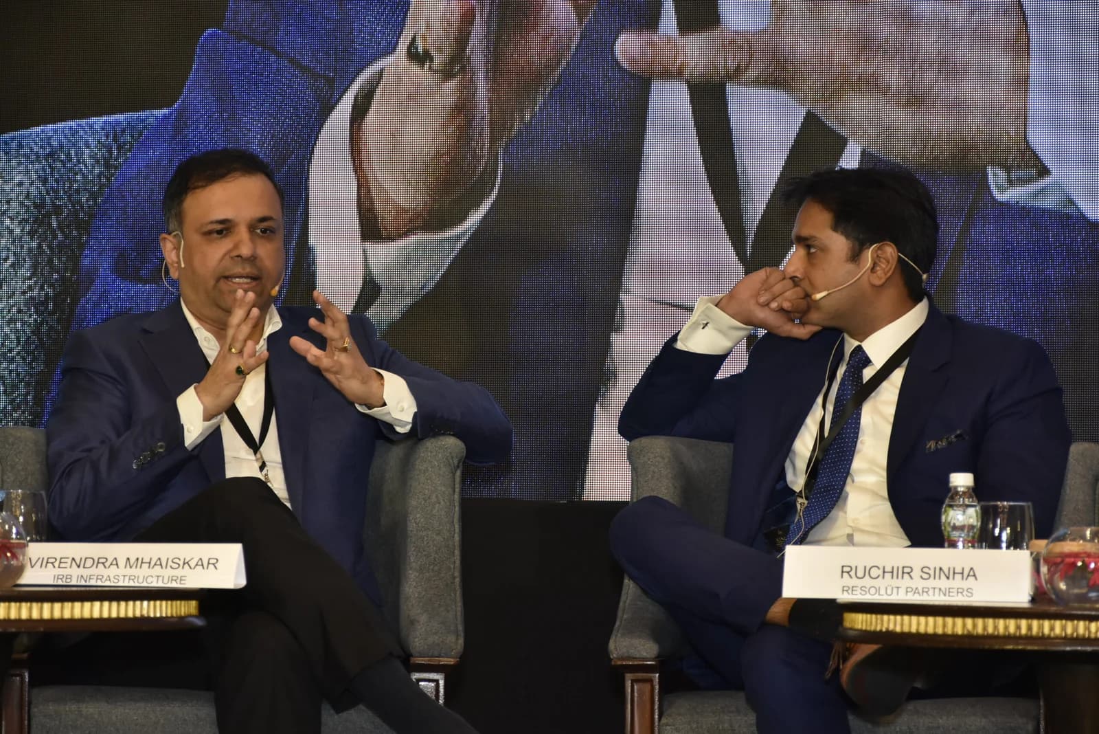 Conference speaker at podium 50