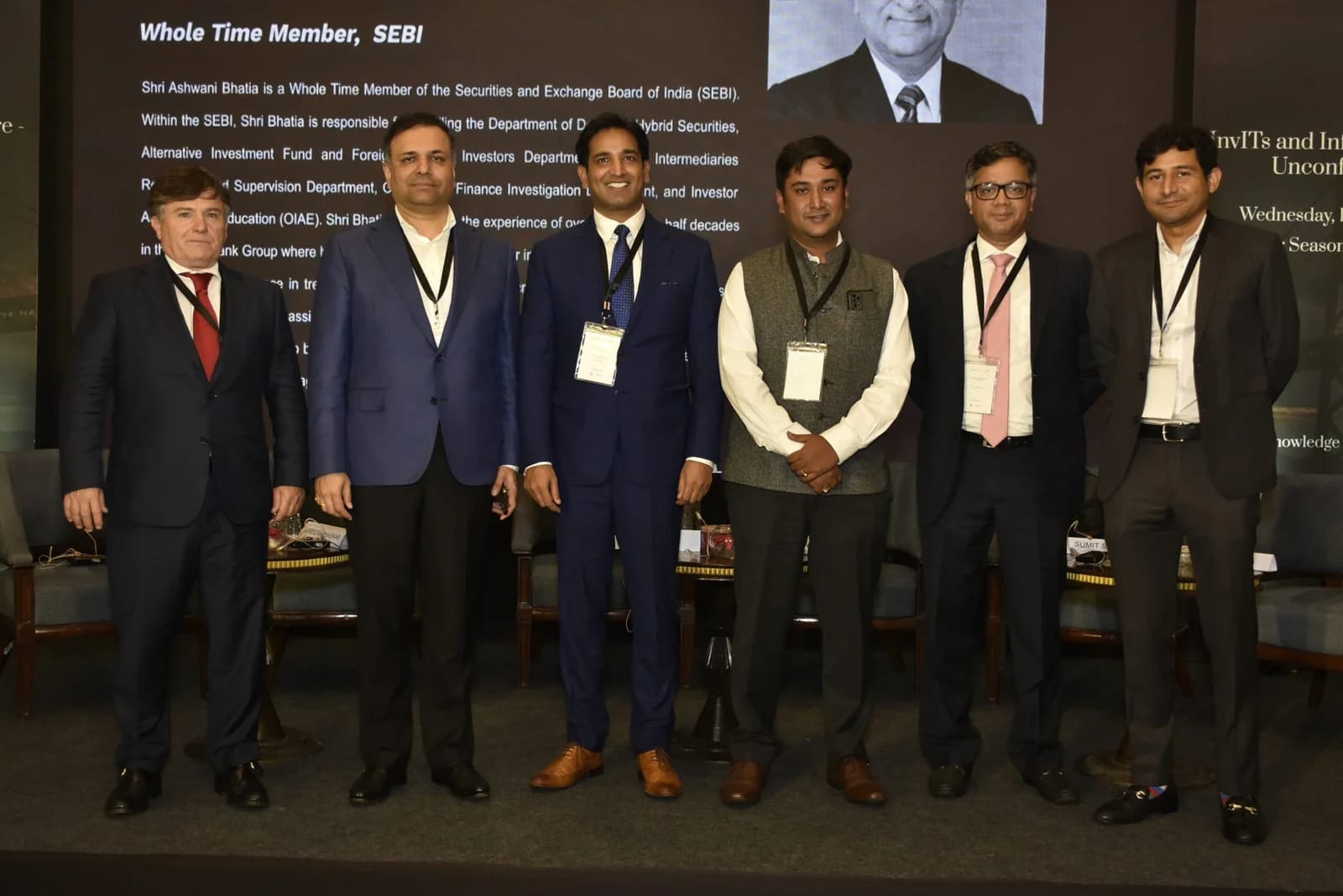 Conference speaker at podium 52