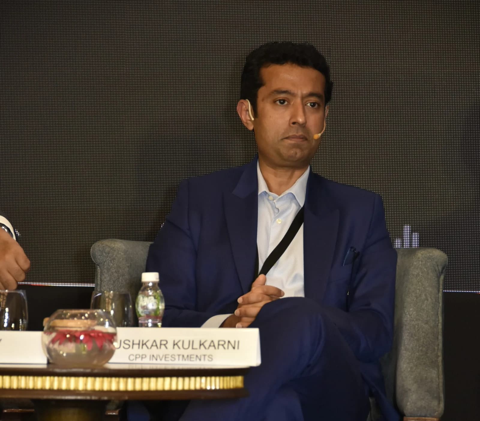 Conference speaker at podium 56