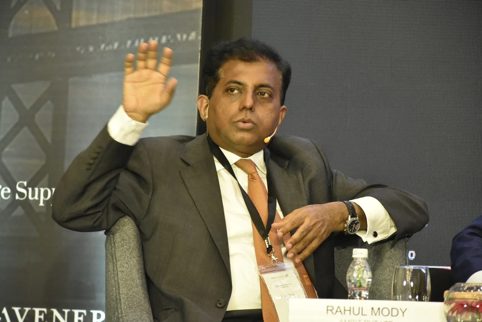 Conference speaker at podium 57