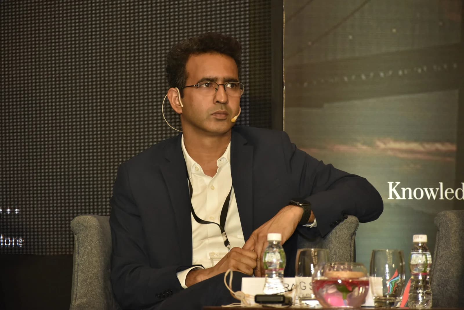 Conference speaker at podium 58