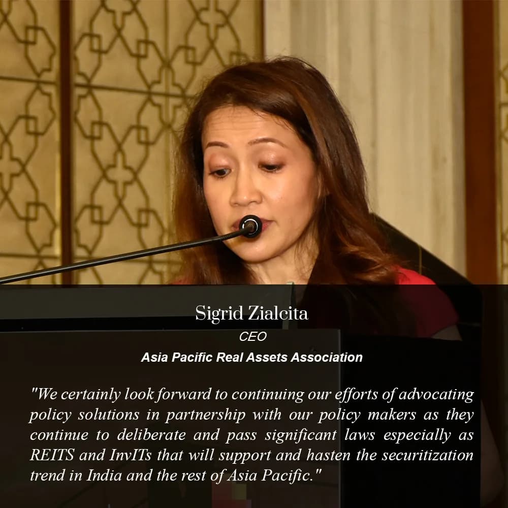 Conference speaker at podium 6