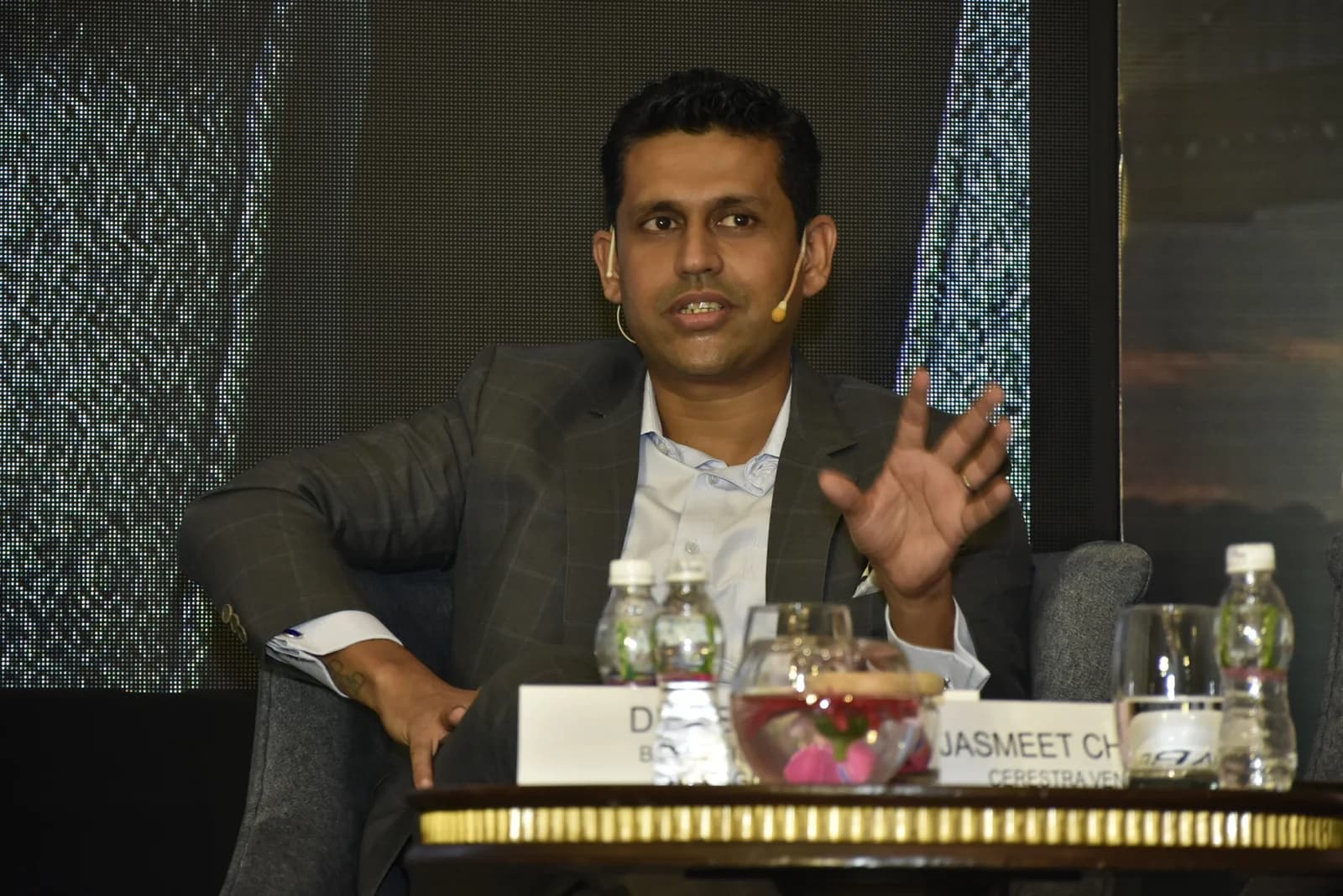 Conference speaker at podium 66