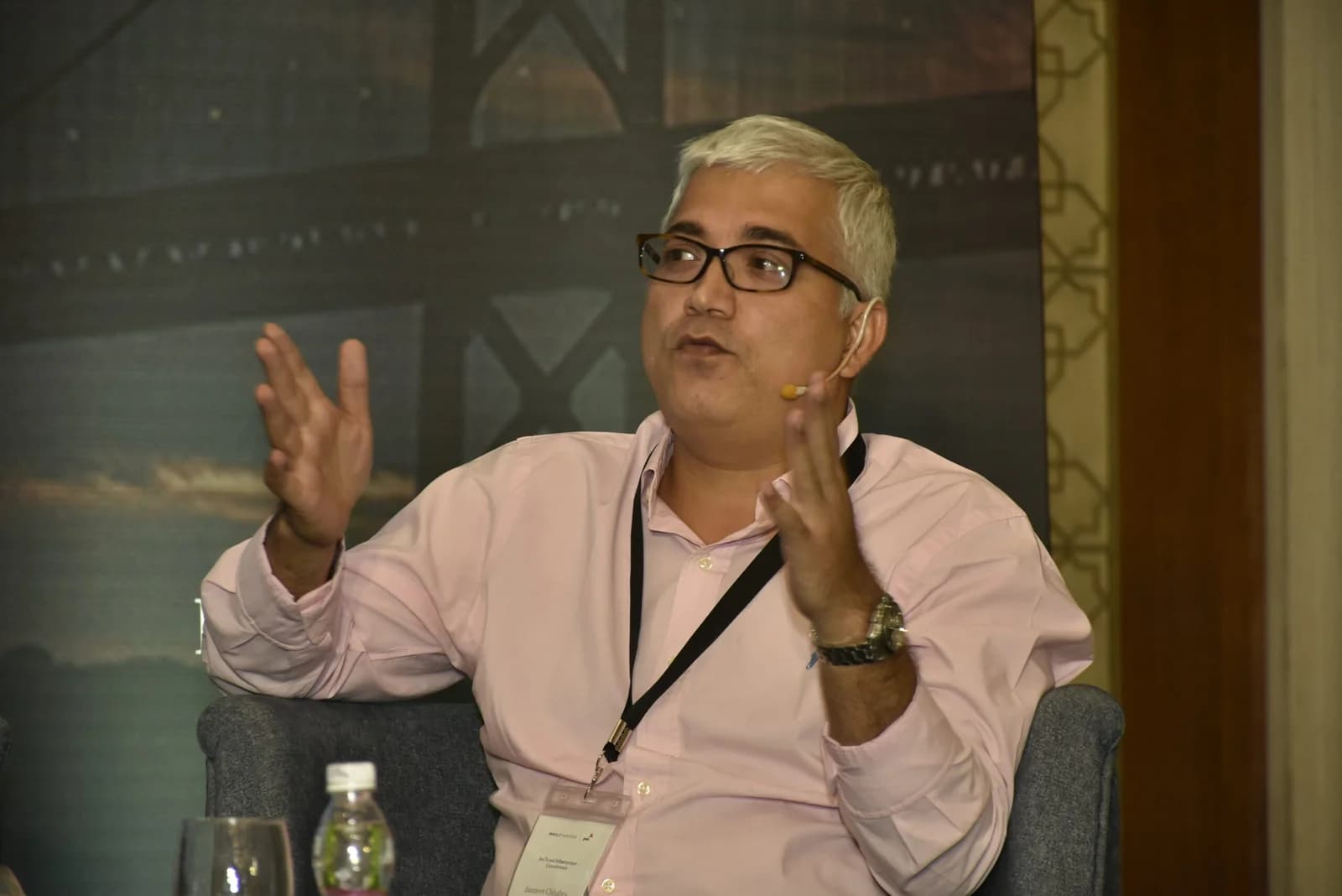 Conference speaker at podium 67