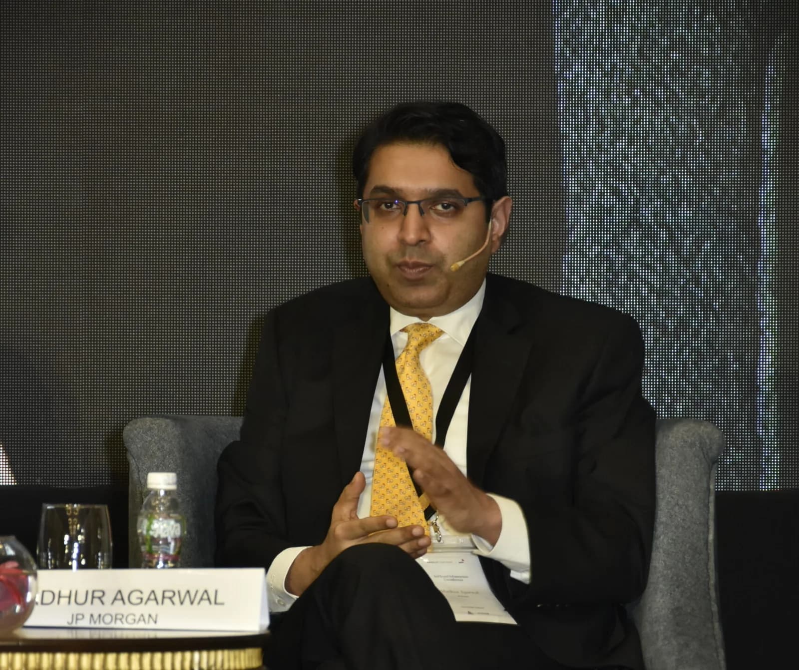 Conference speaker at podium 68