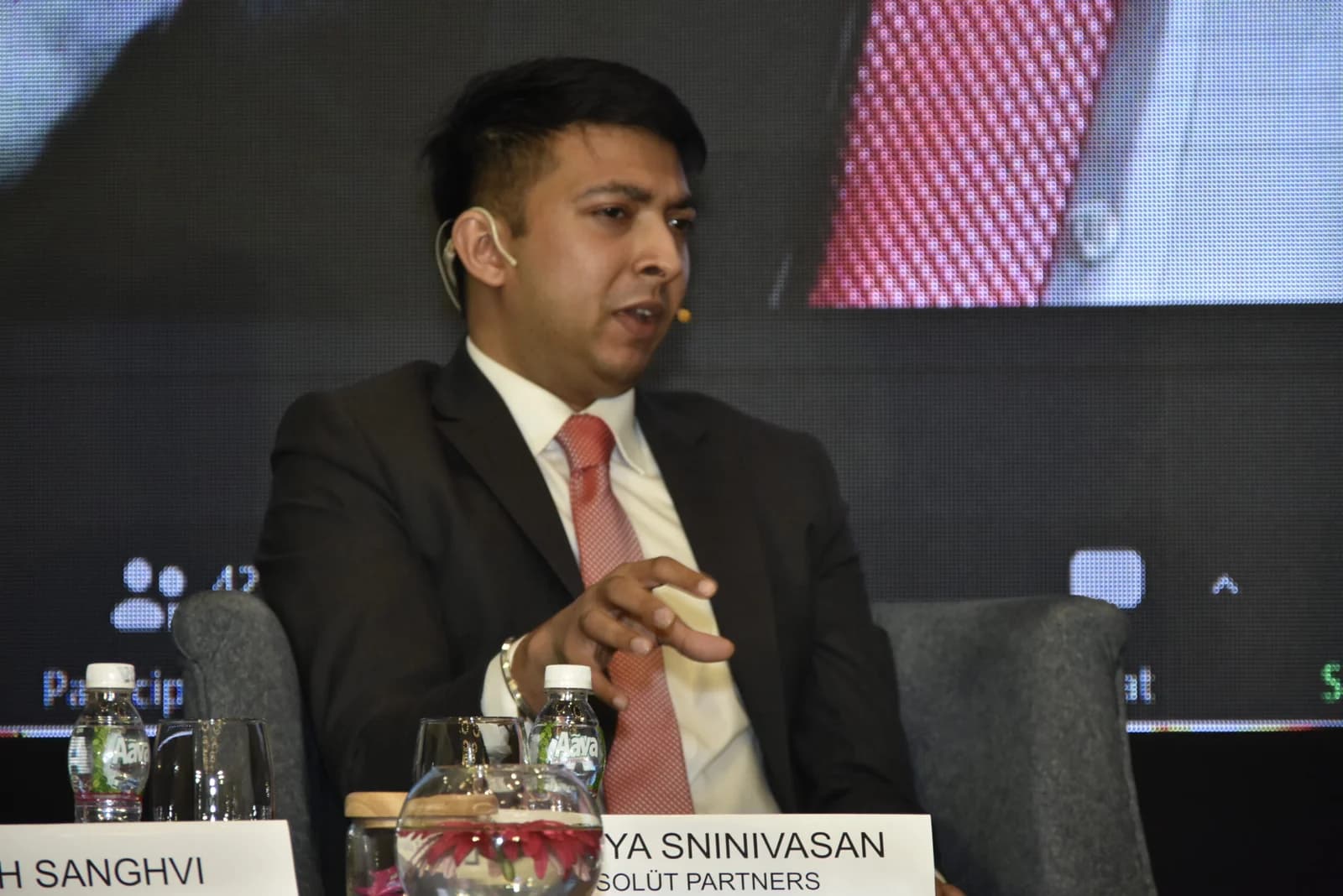 Conference speaker at podium 69