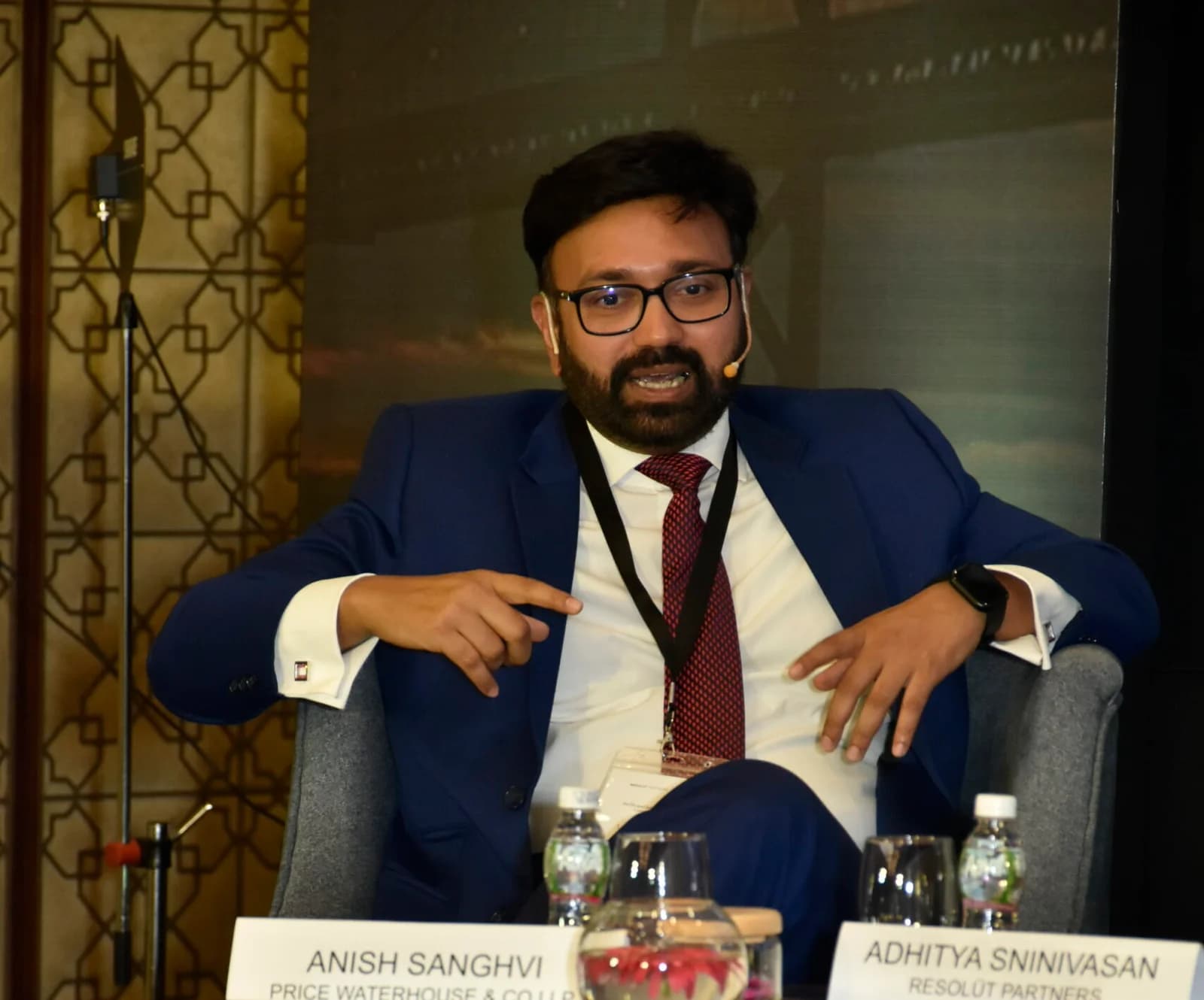 Conference speaker at podium 70