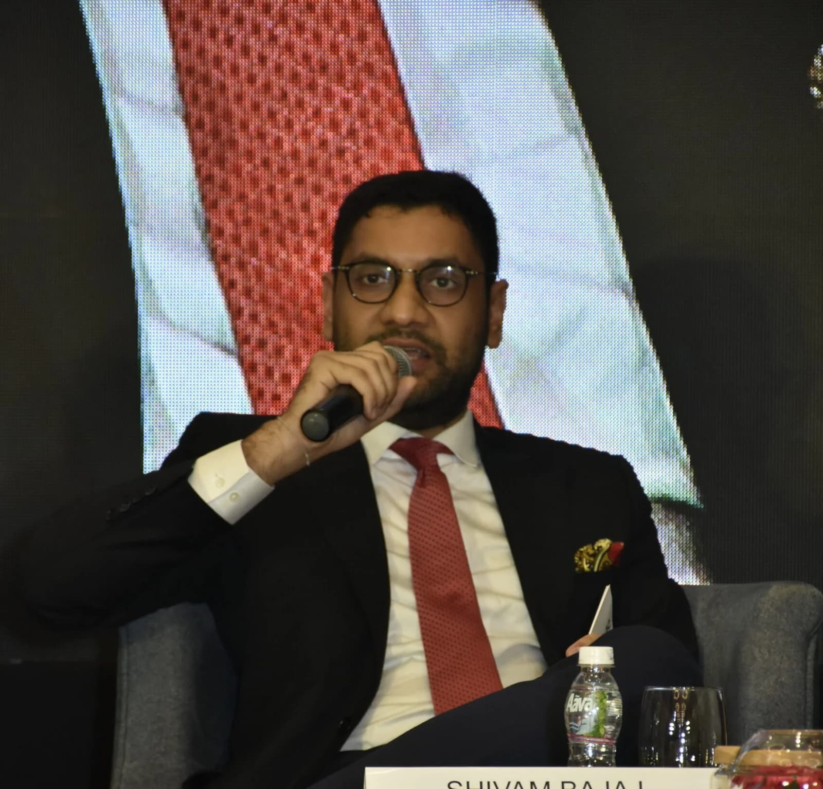 Conference speaker at podium 71