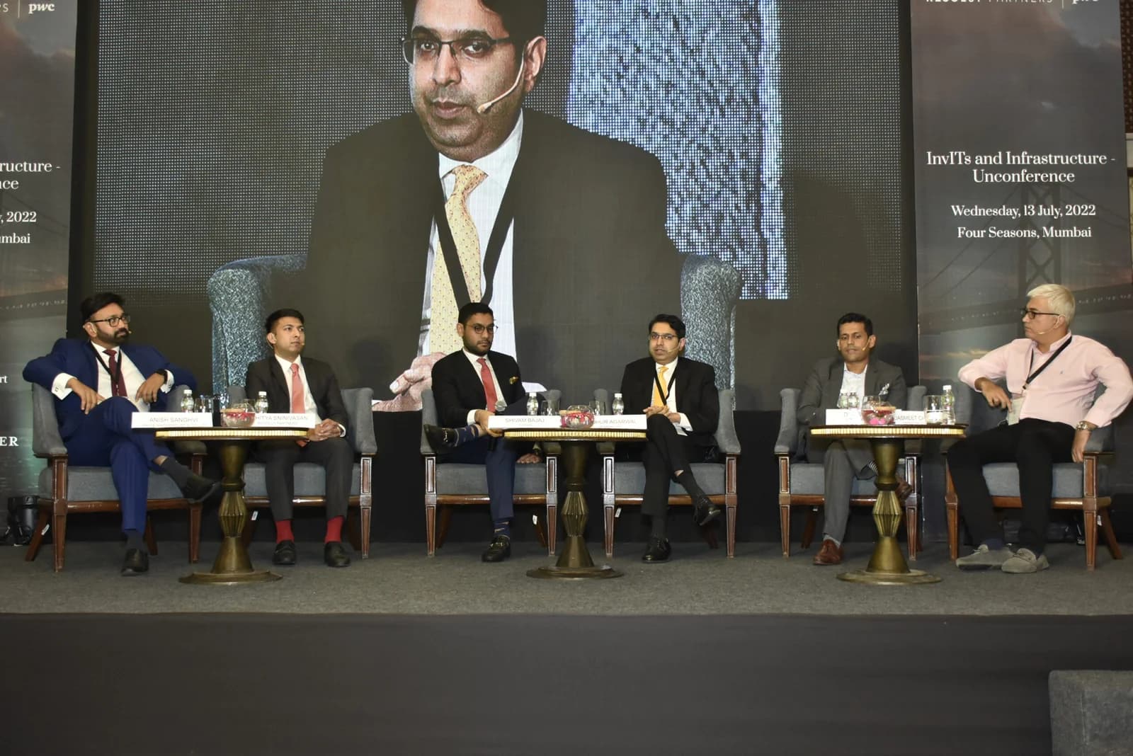 Conference speaker at podium 75