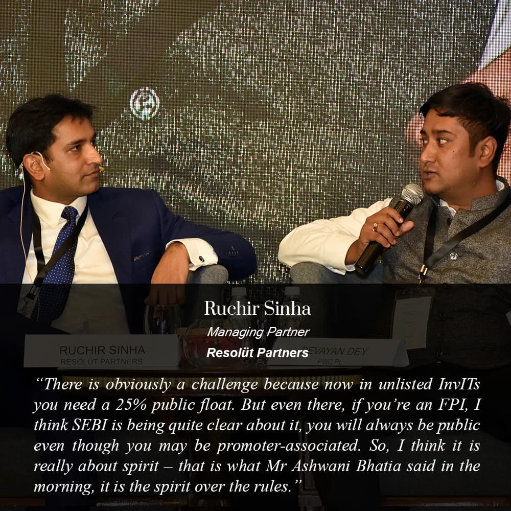 Conference speaker at podium 8