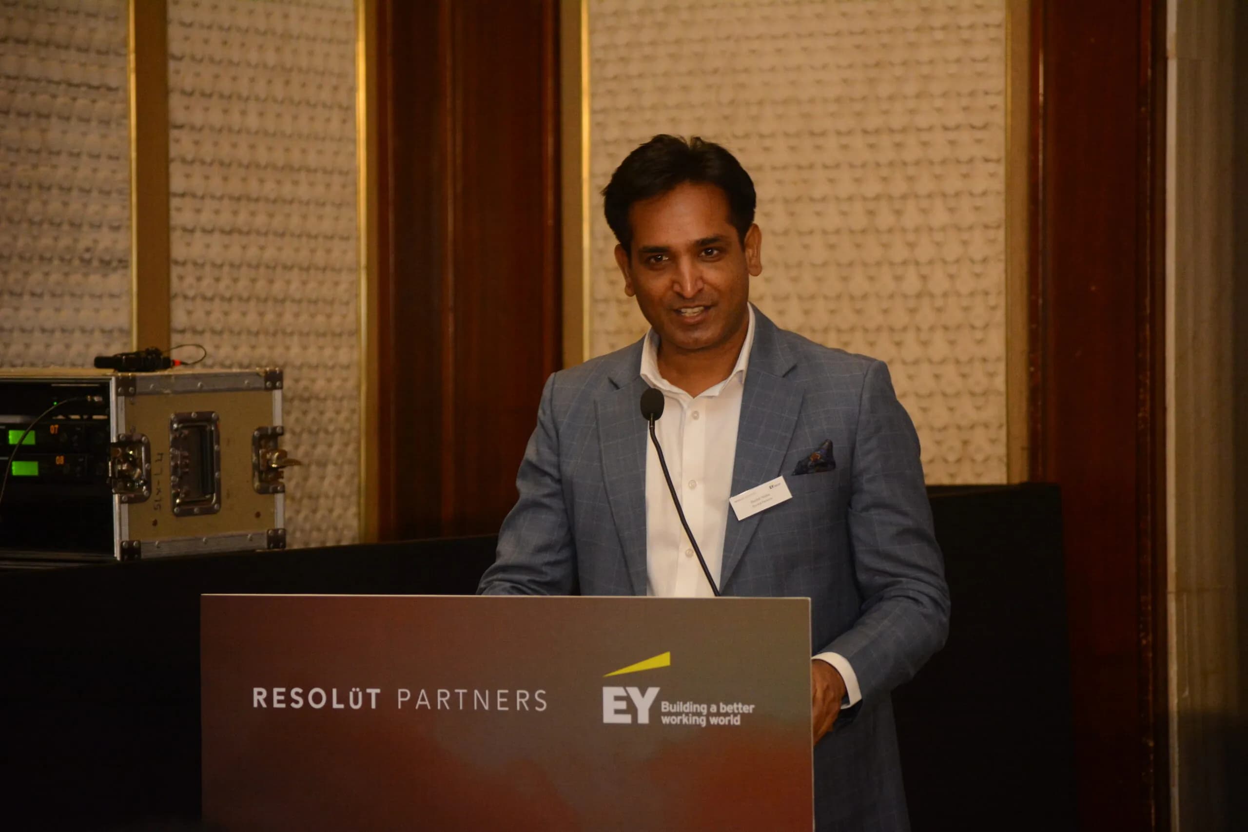 Conference speaker at podium 2