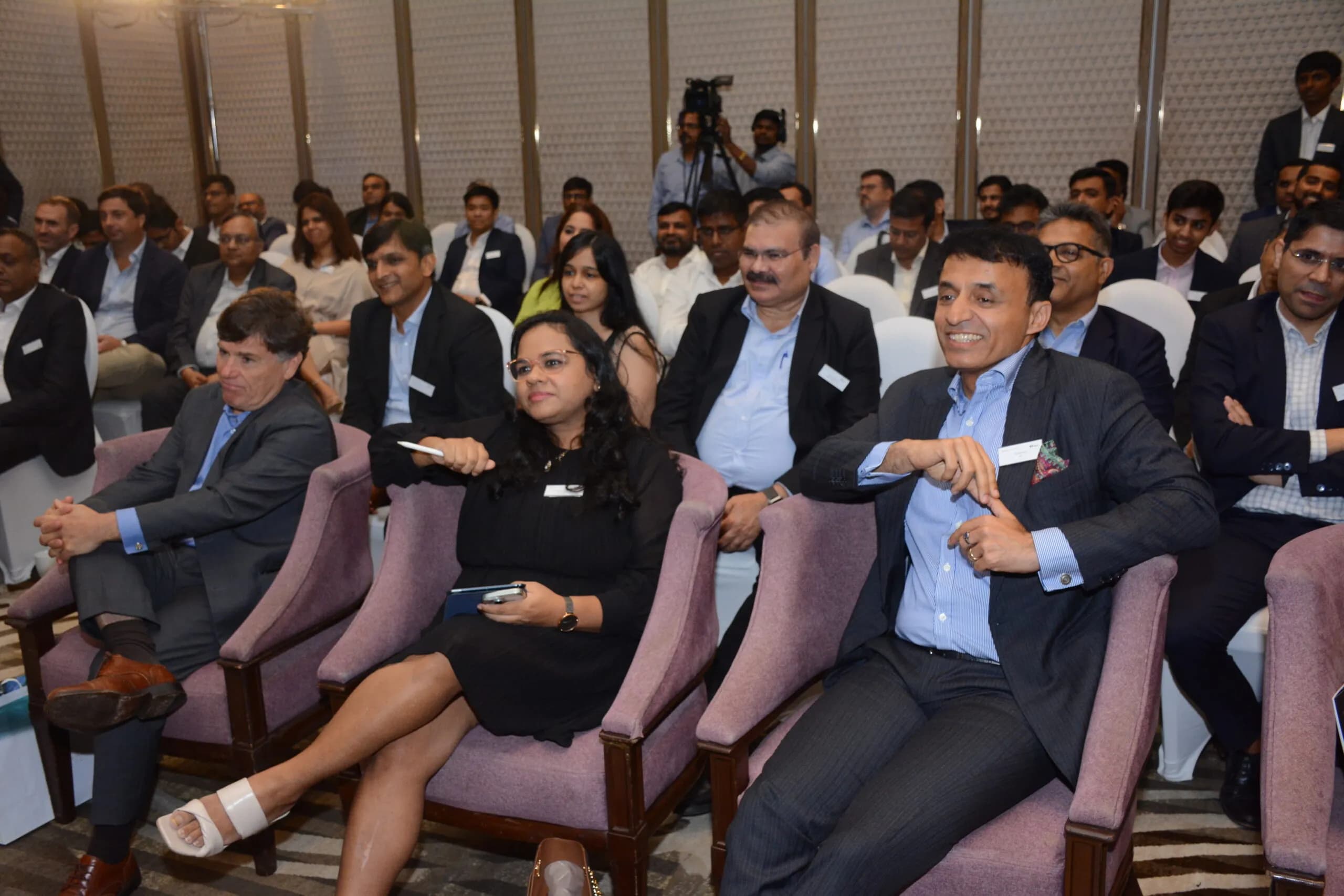 Conference speaker at podium 26