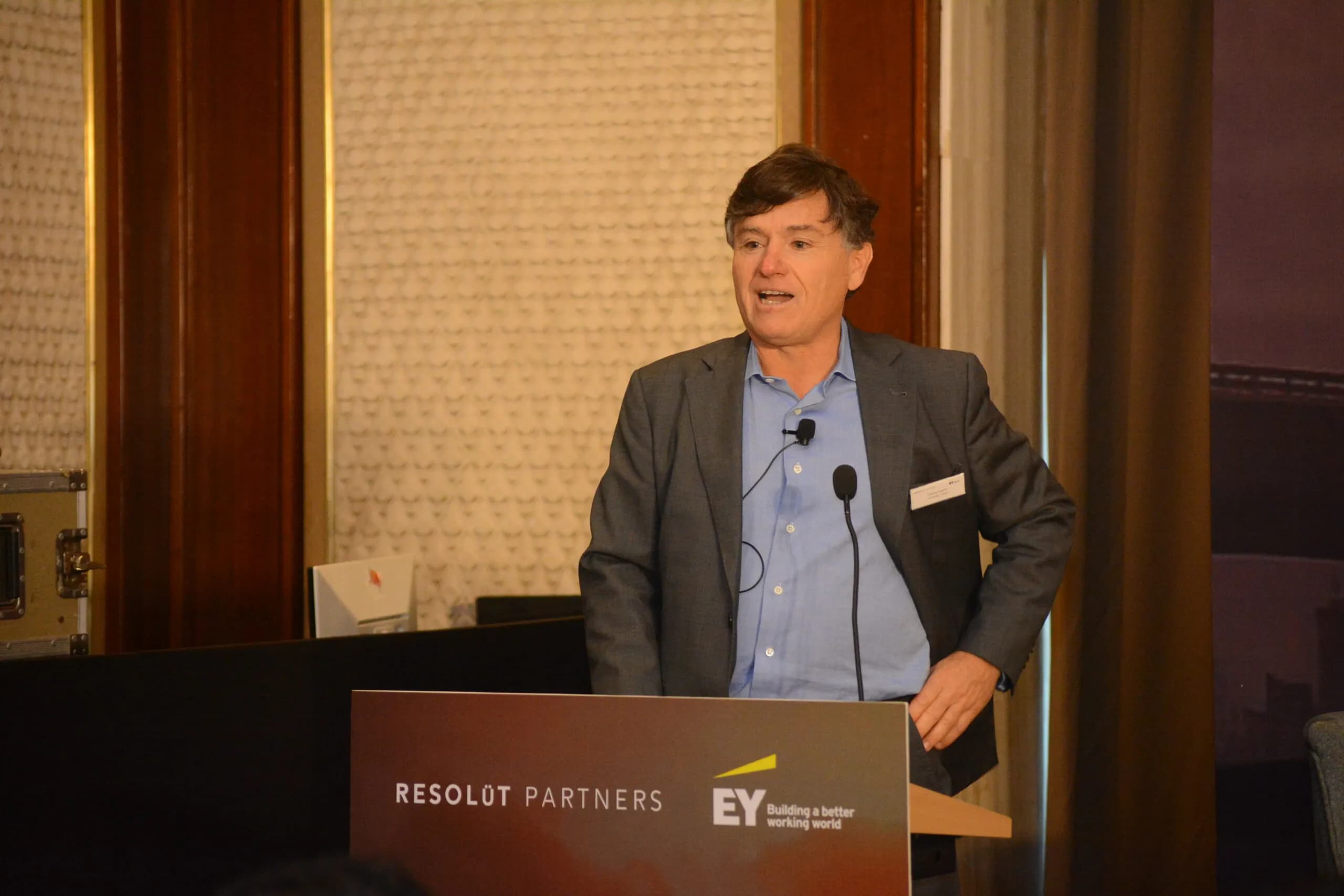 Conference speaker at podium 3