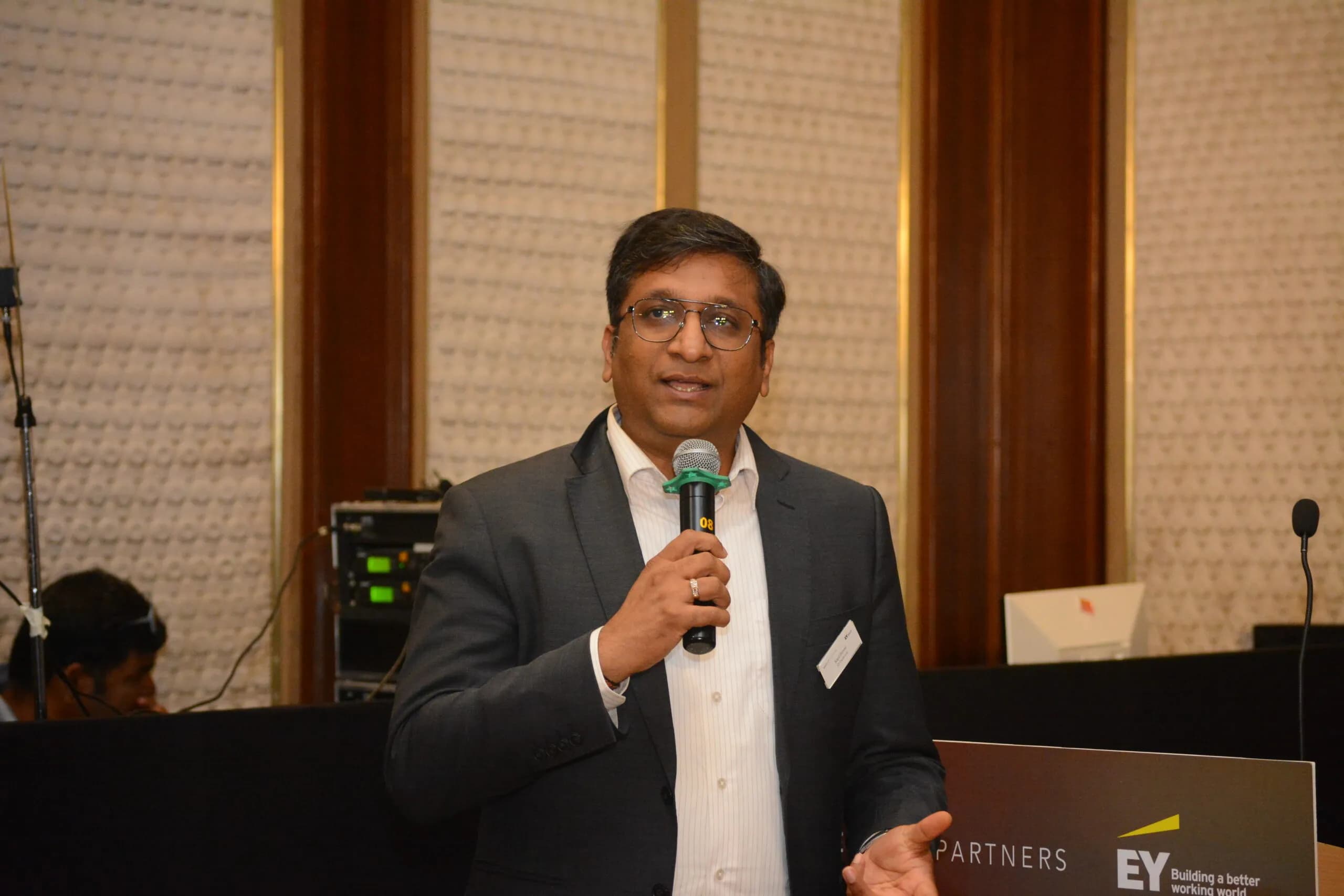 Conference speaker at podium 31