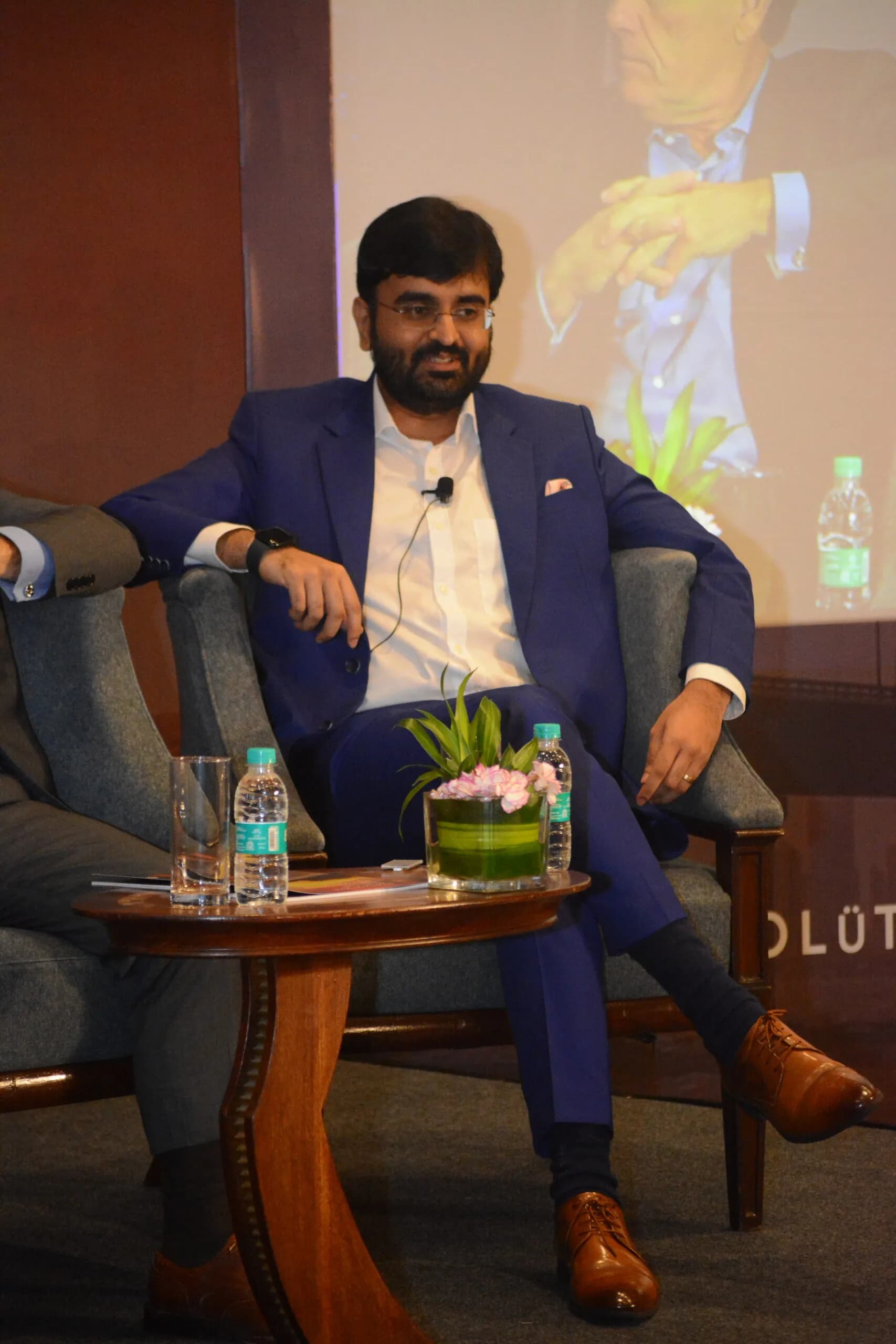 Conference speaker at podium 5