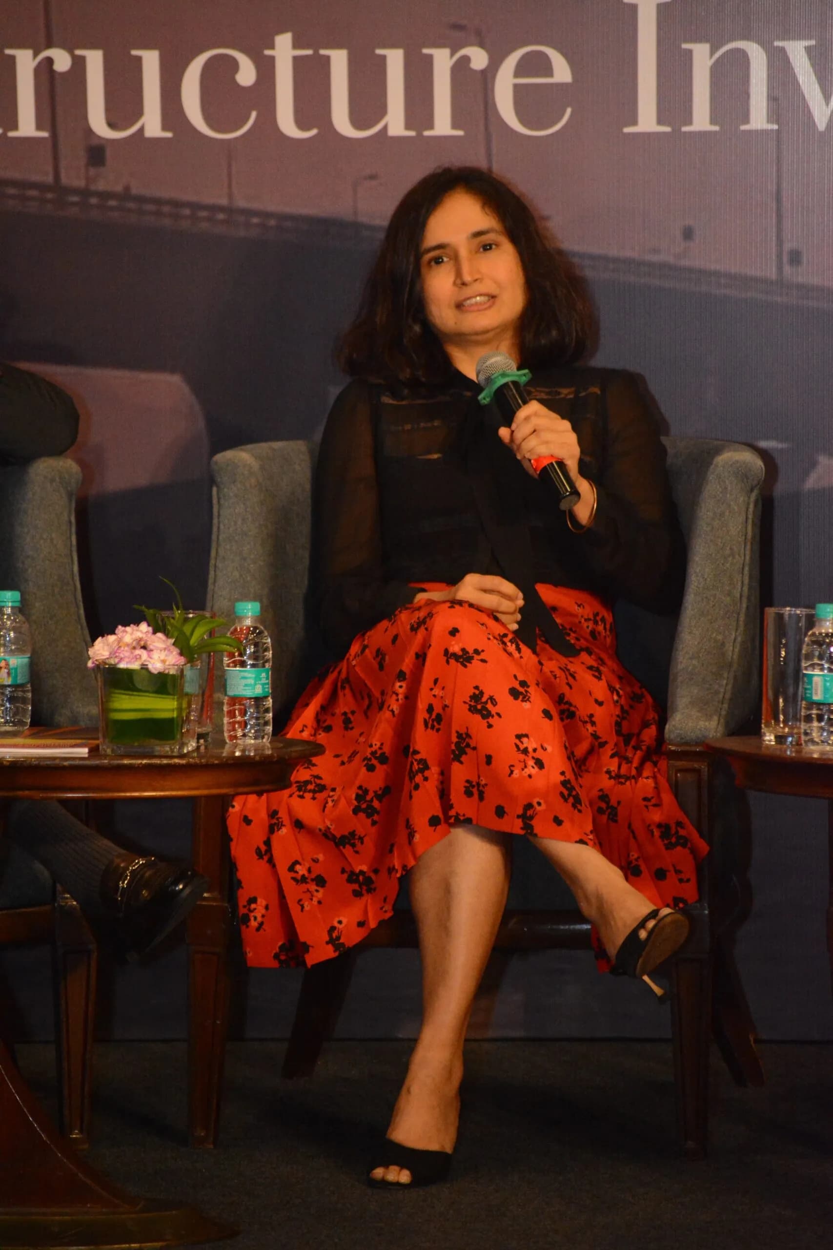 Conference speaker at podium 6