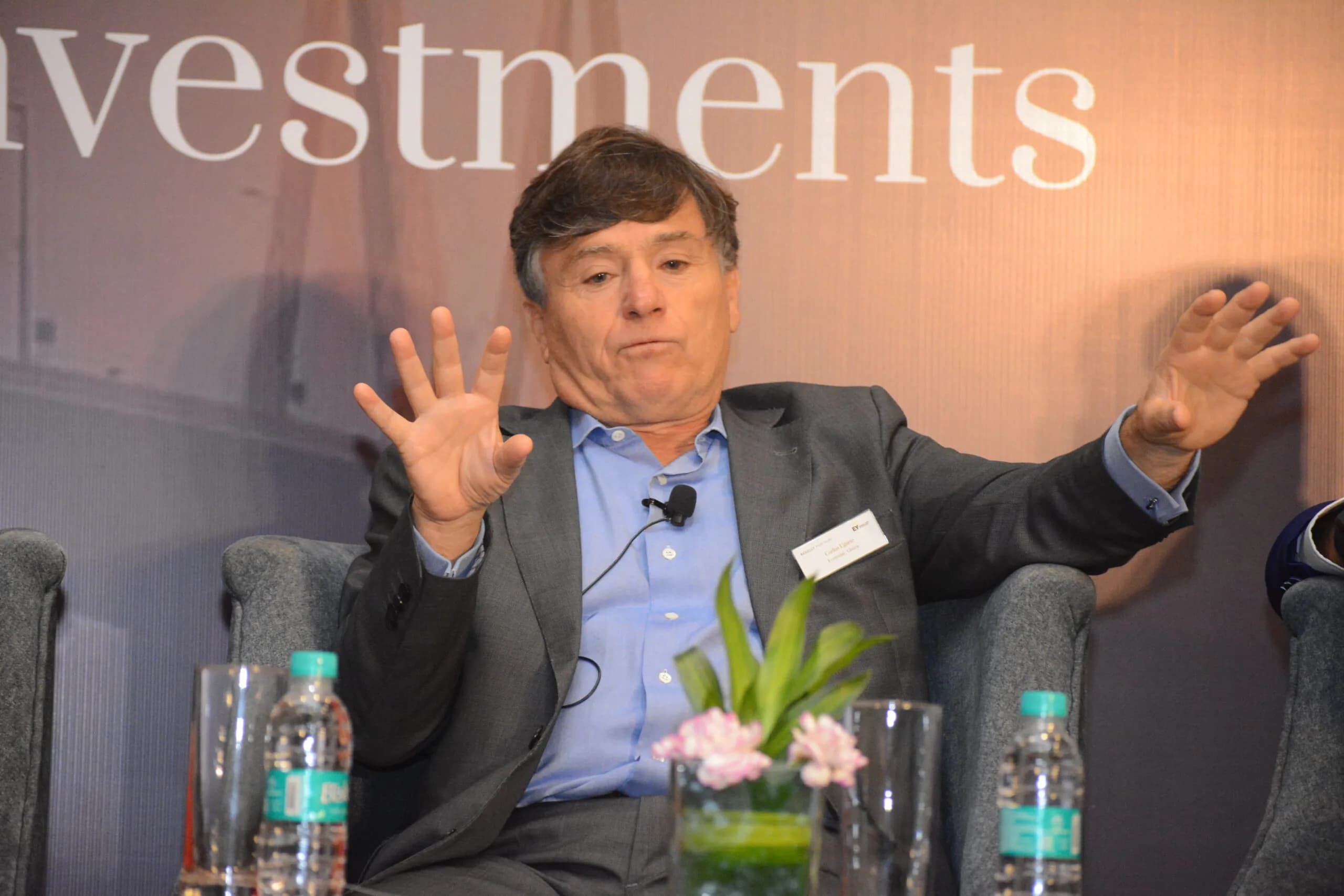 Conference speaker at podium 8