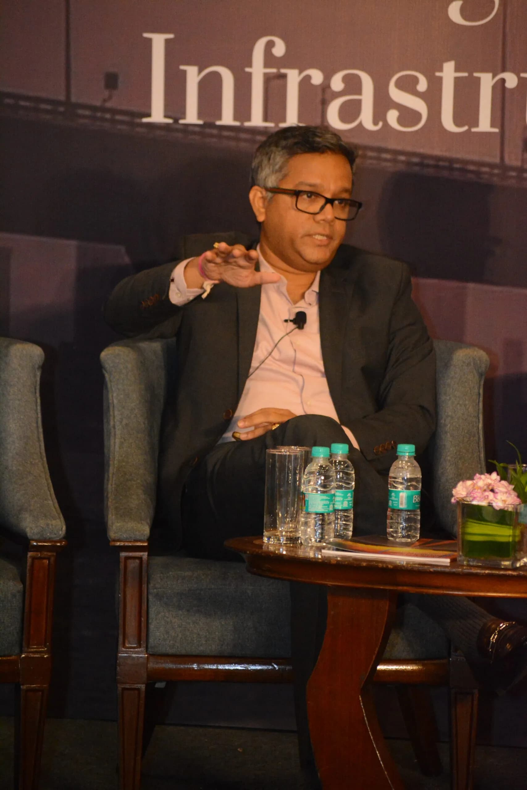 Conference speaker at podium 9